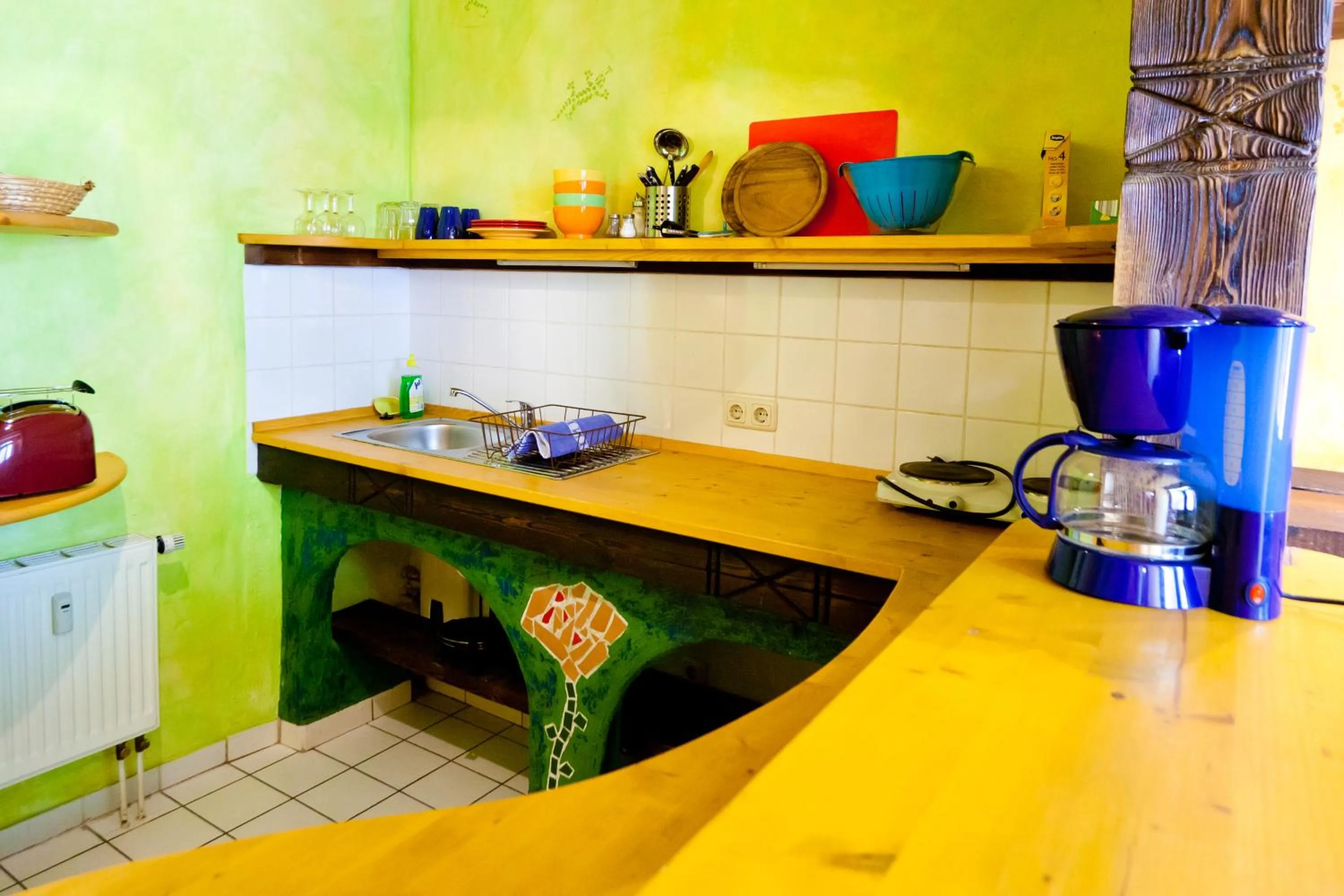 Kitchen or kitchenette in Gästehaus Mezcalero