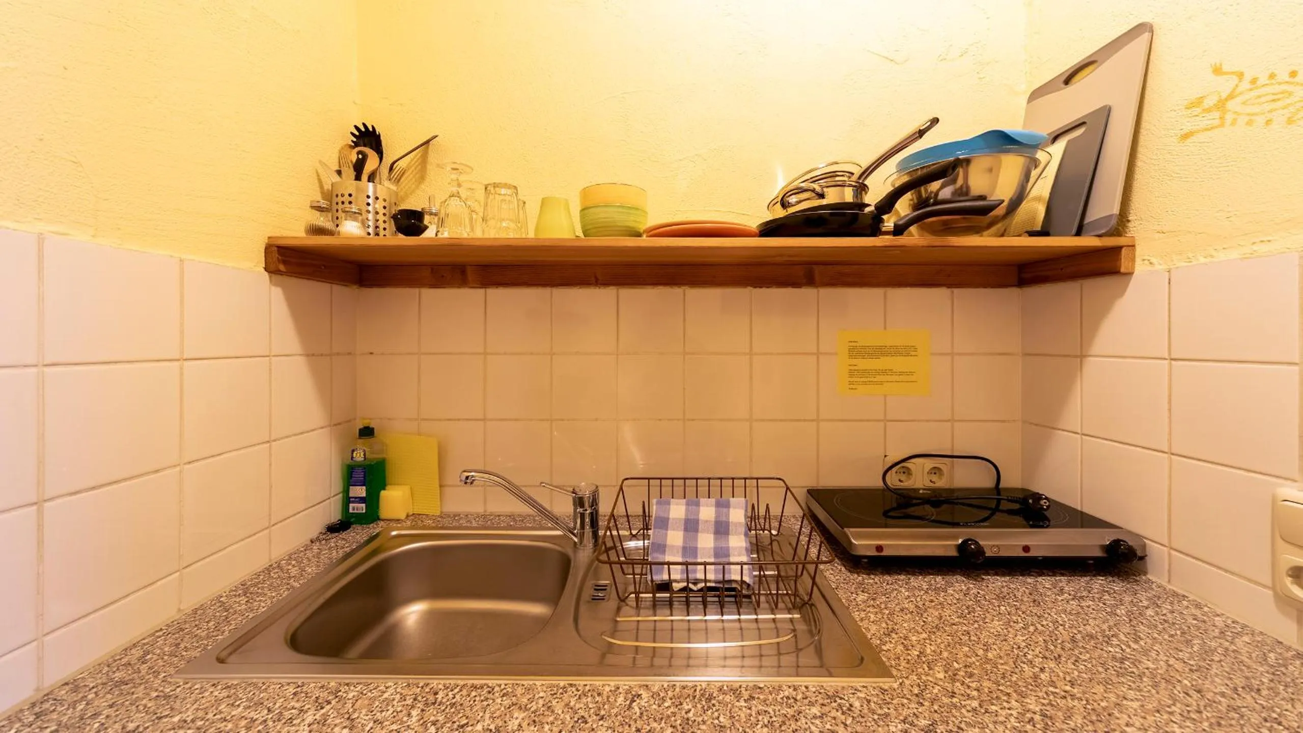 Kitchen or kitchenette in Gästehaus Mezcalero