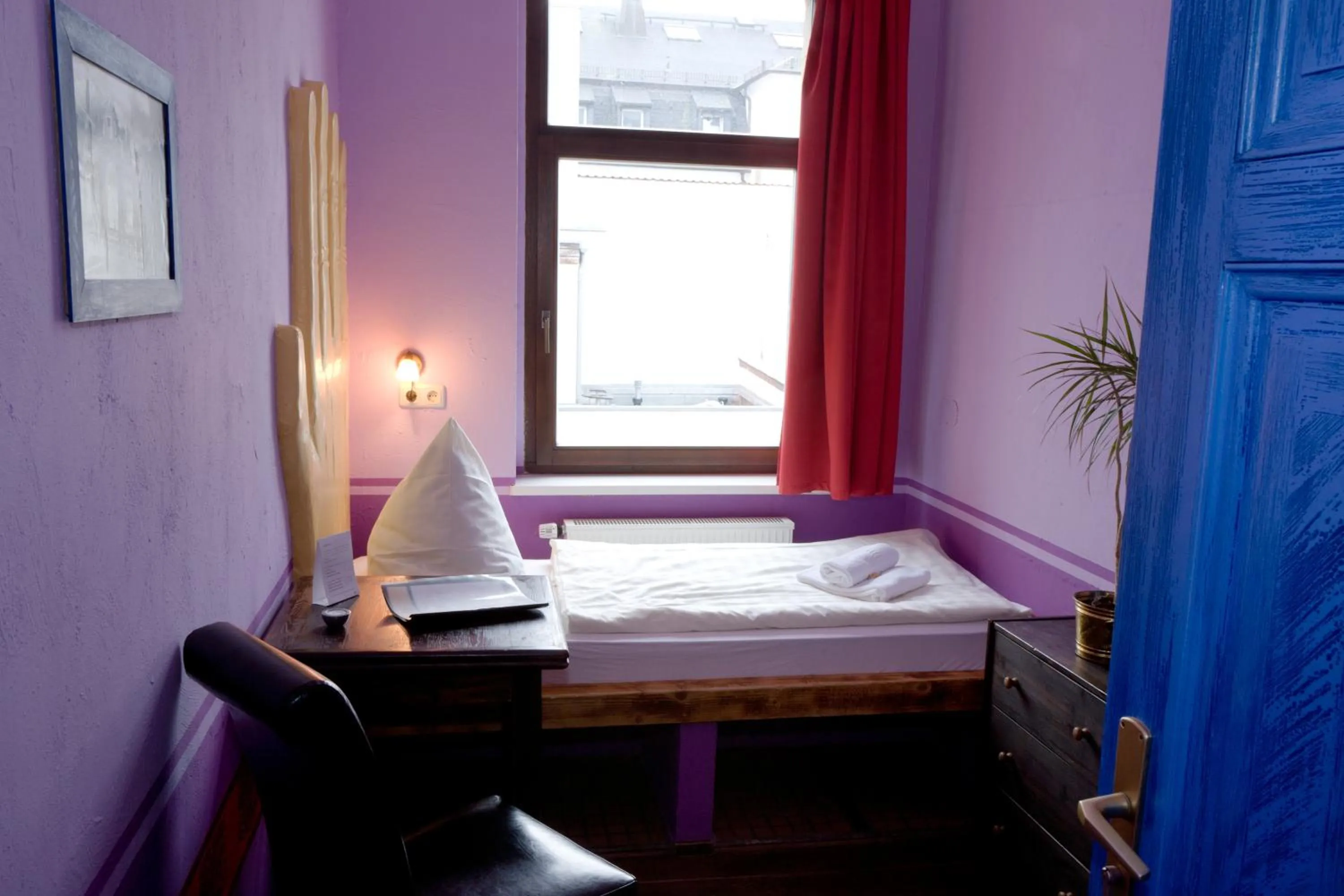 Bed in Gästehaus Mezcalero