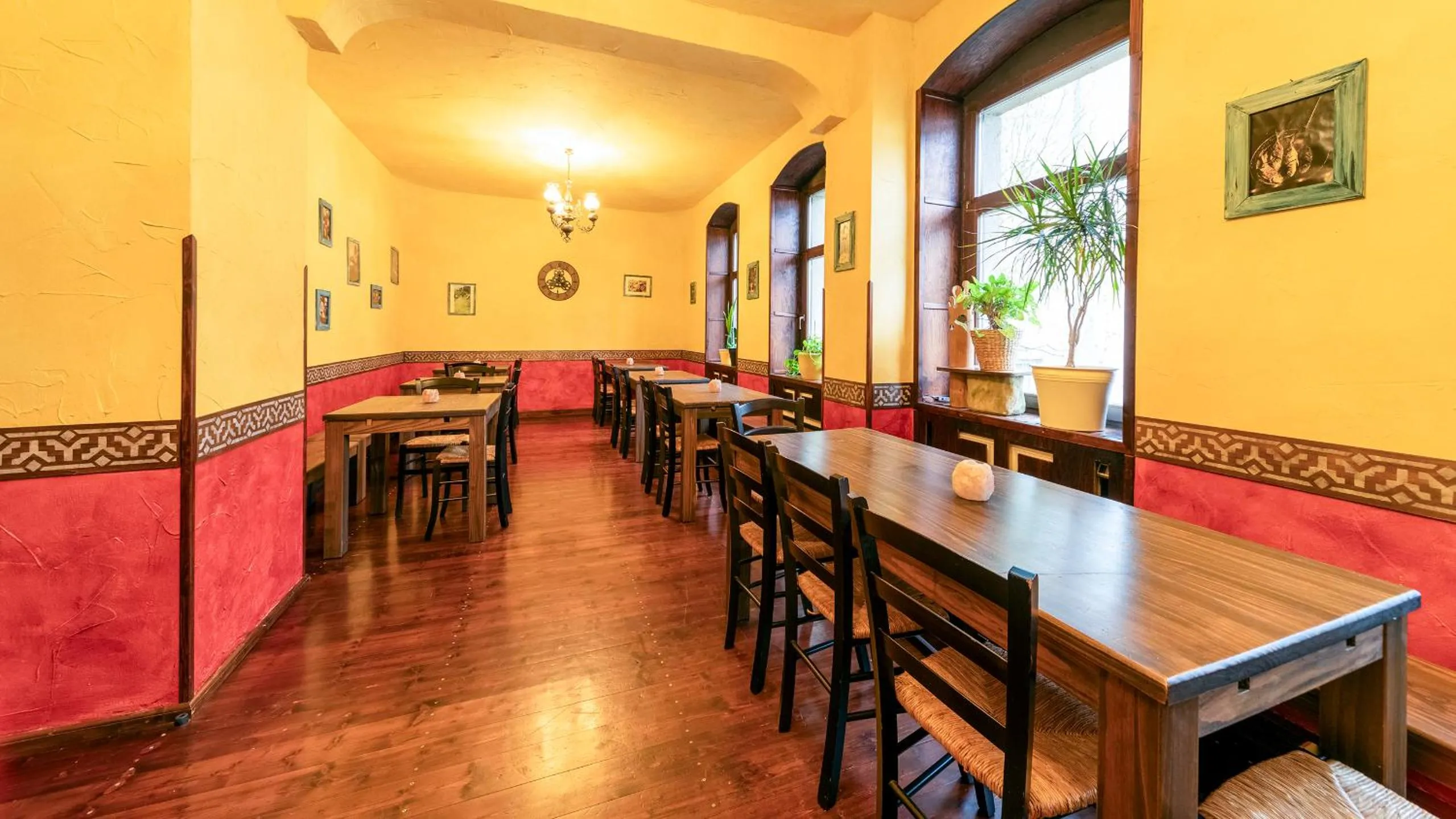 Communal lounge/ TV room in Gästehaus Mezcalero