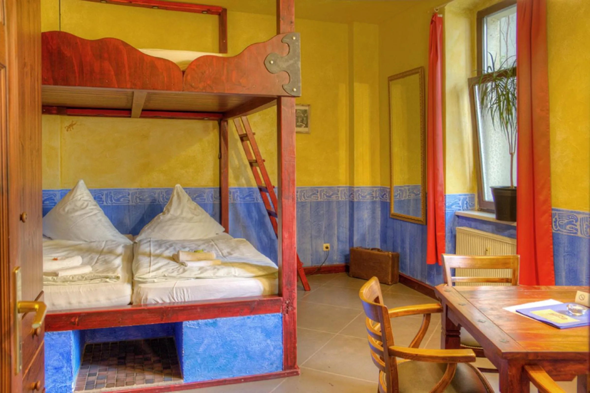 Photo of the whole room, Bed in Gästehaus Mezcalero