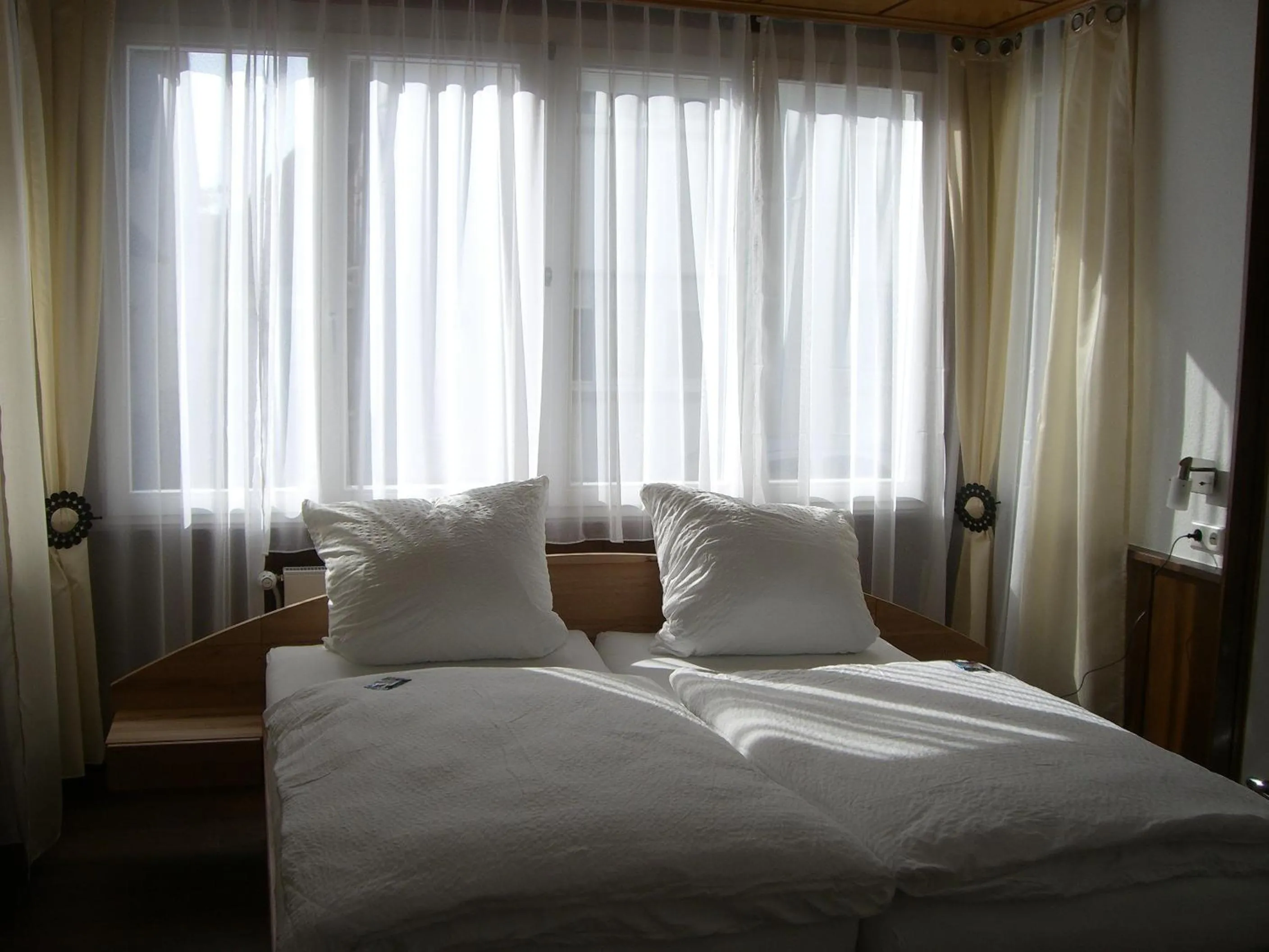 Photo of the whole room, Bed in Hotel Sunnegässle