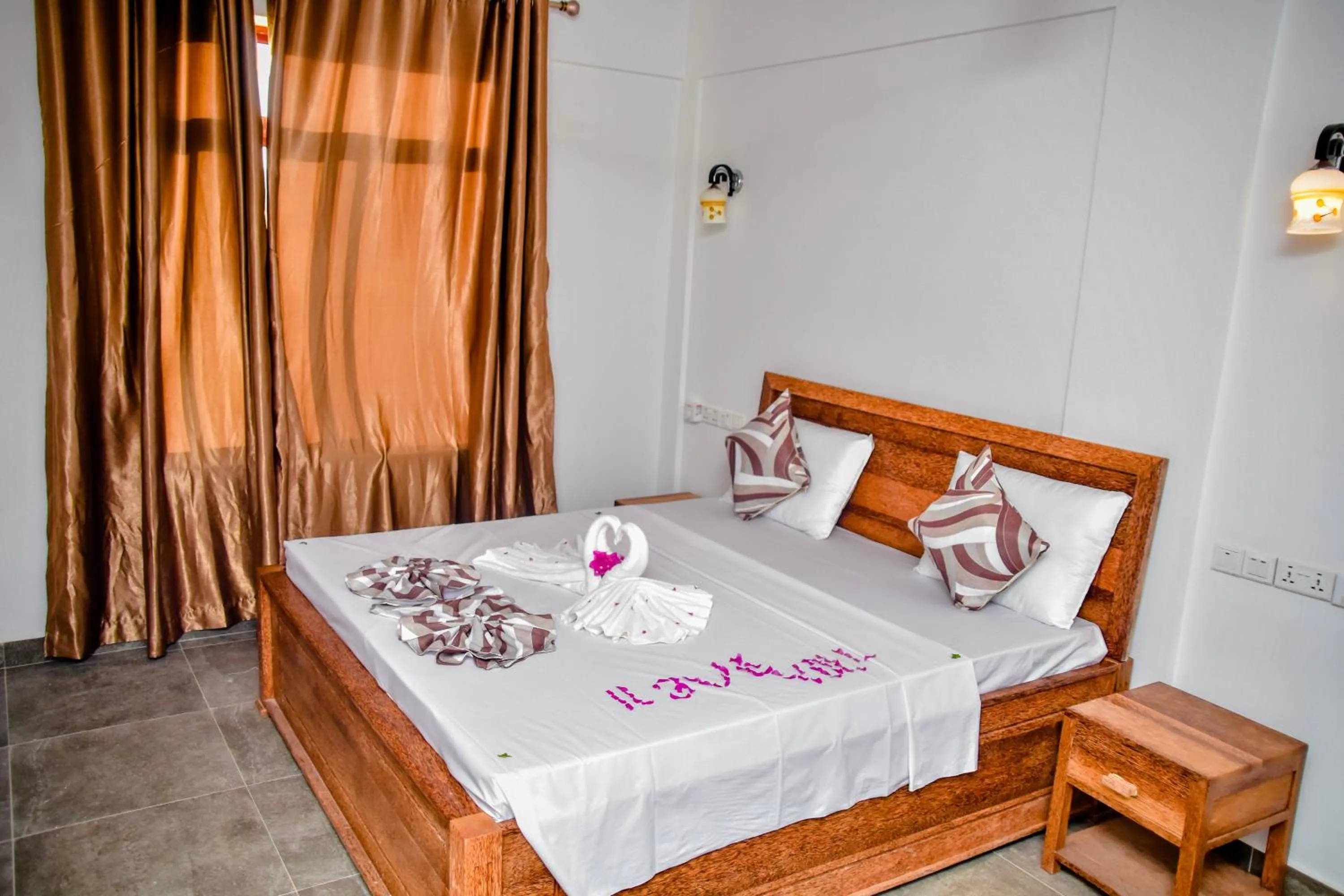 Bed in Zanoceanique Hotel