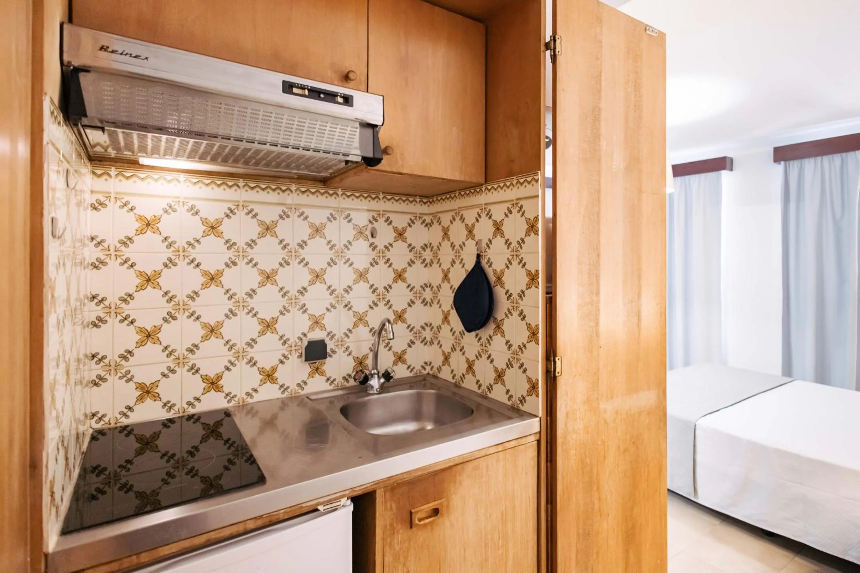 Kitchen or kitchenette, Bed in Murças74 - Studio Apartments