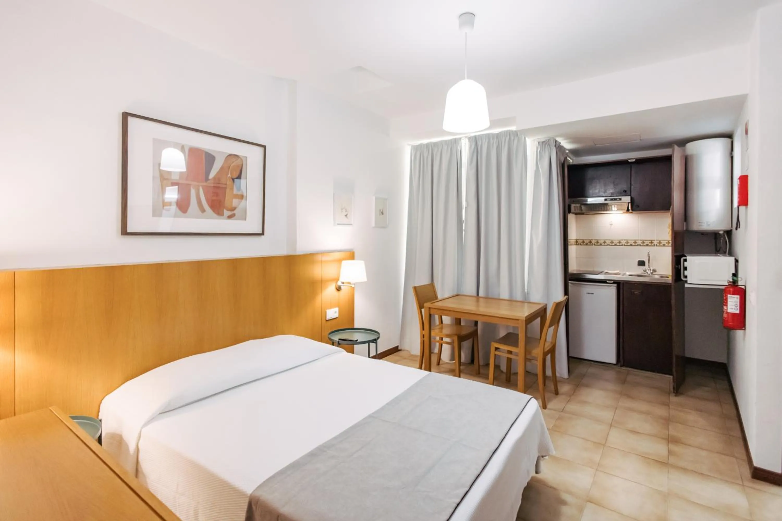 Kitchen or kitchenette, Bed in Murças74 - Studio Apartments