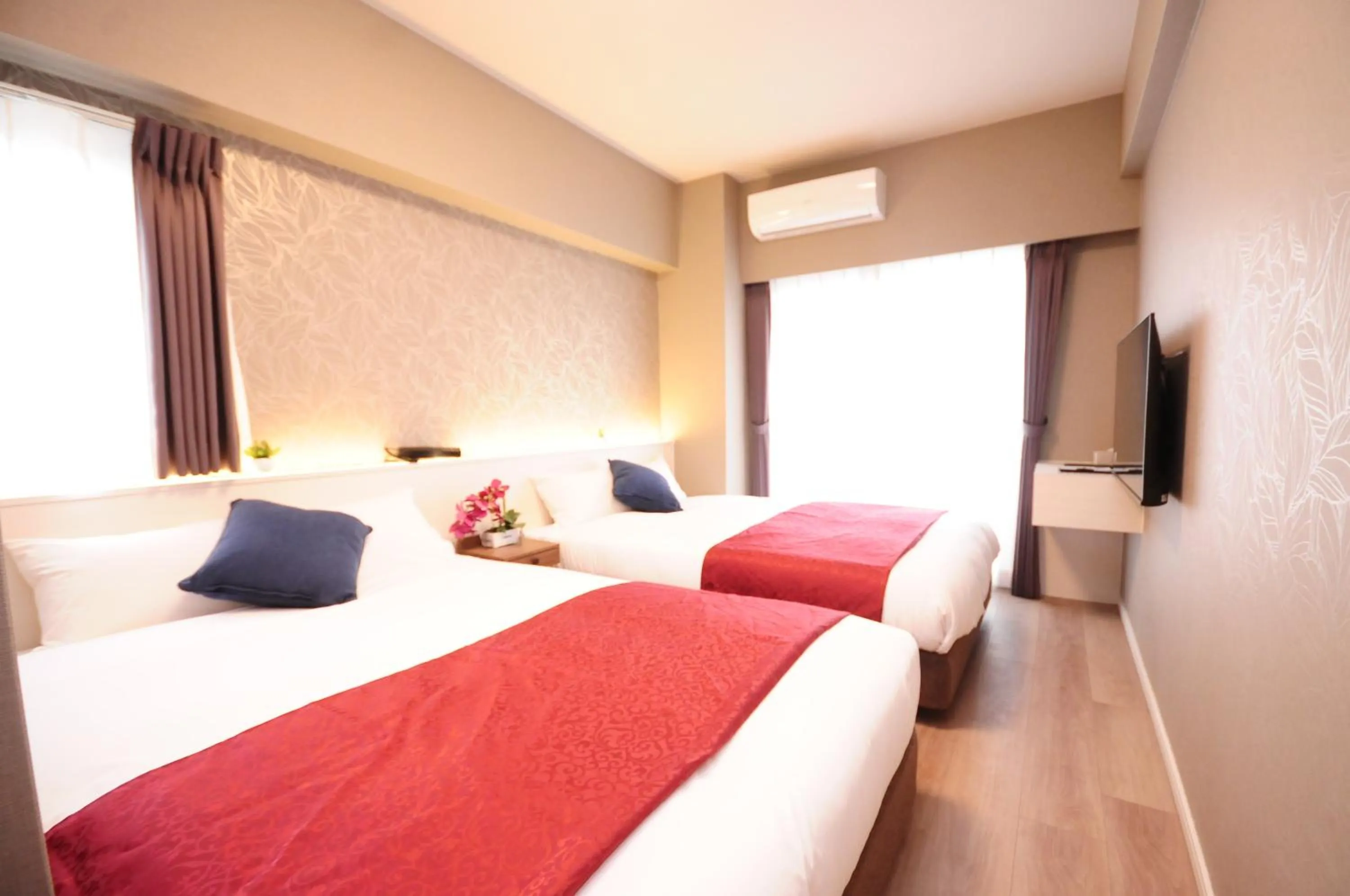 Bed in Hotel Japanesque Fukuoka