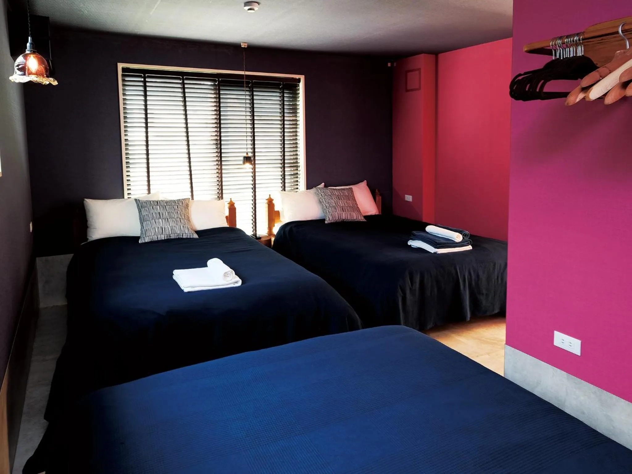 Bed in CHULAX OKINAWA YOMITAN【Designer Condominium Hotel】