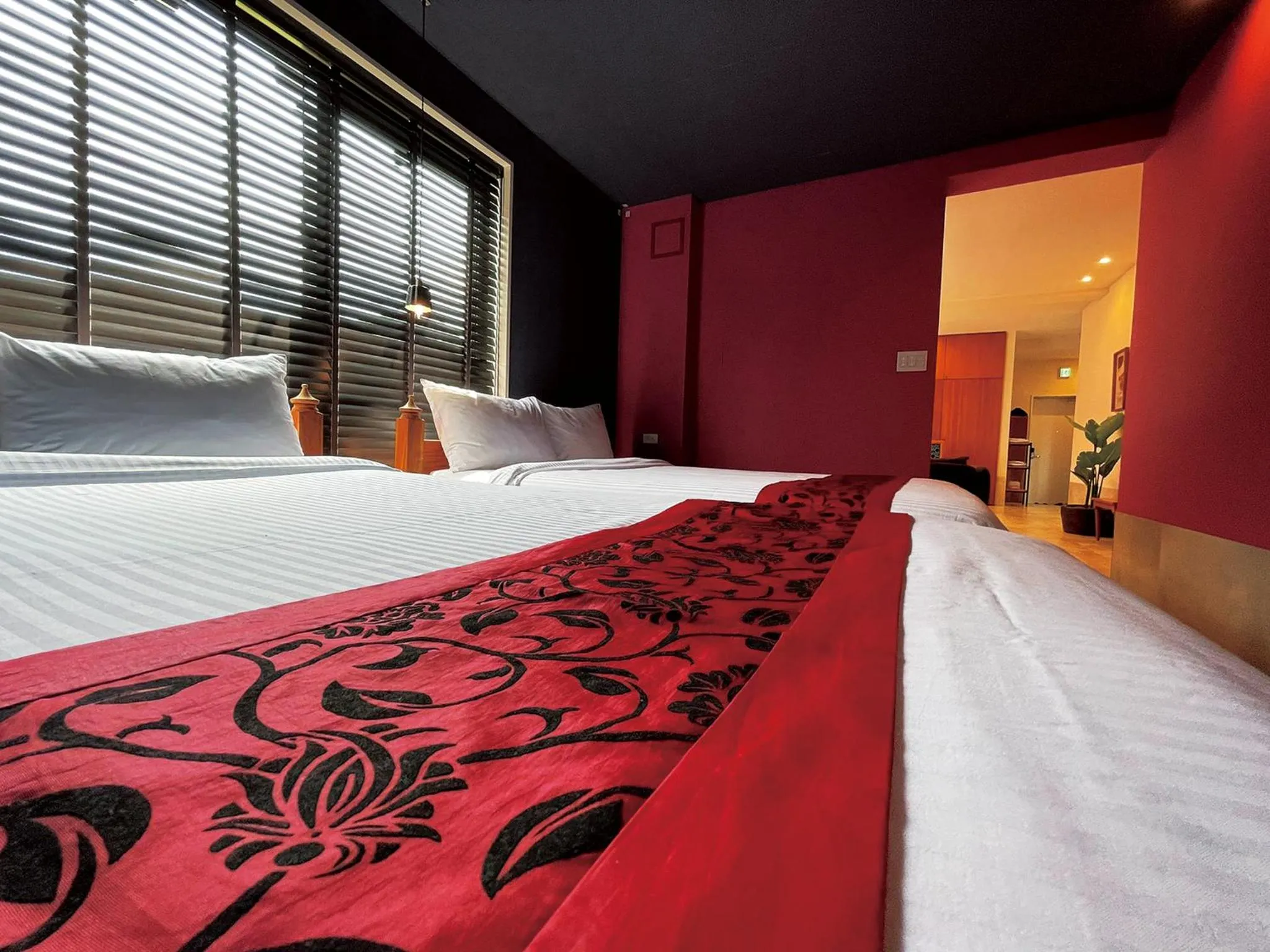 Bed in CHULAX OKINAWA YOMITAN【Designer Condominium Hotel】