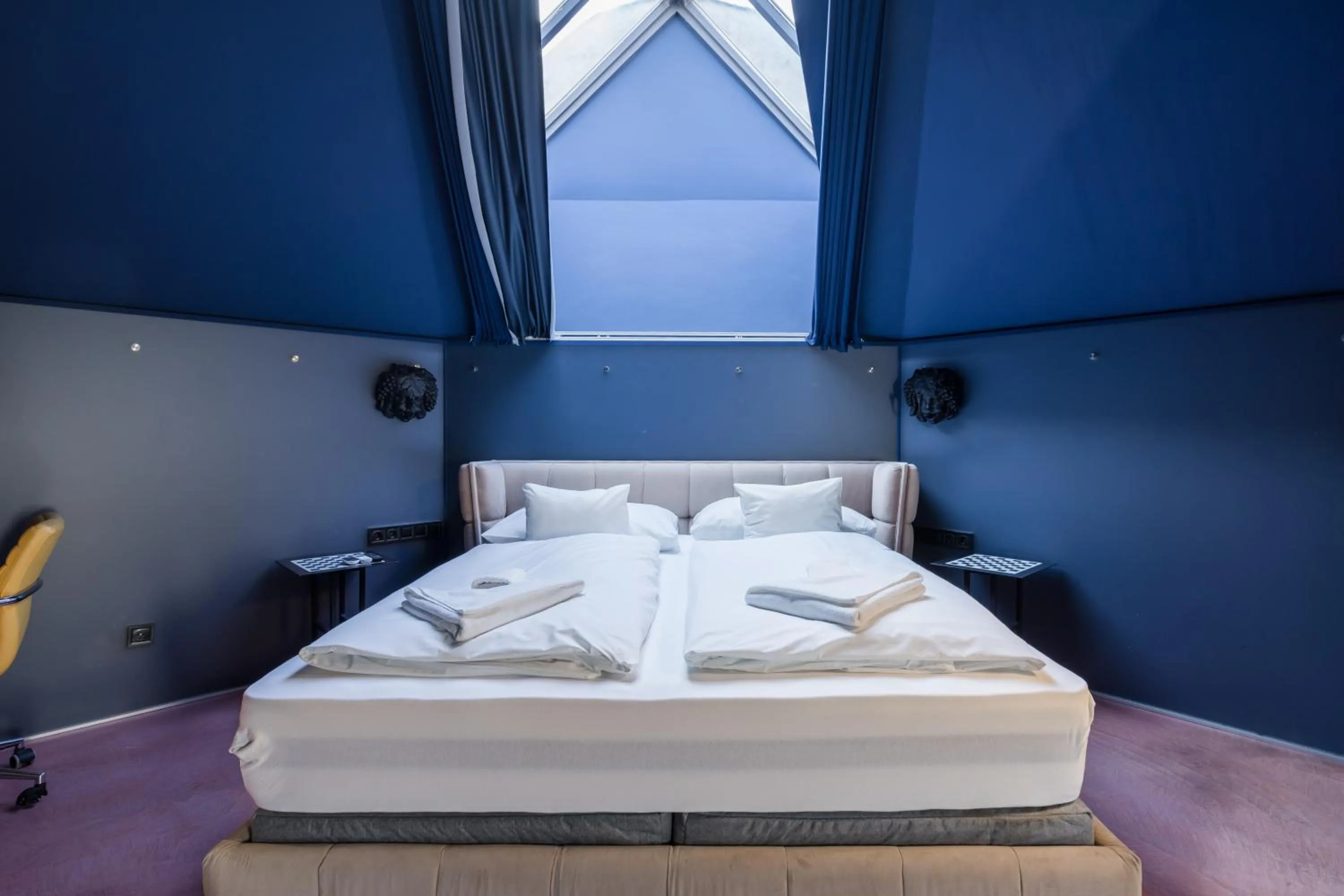 Bed in Butik Apartments, by BQA