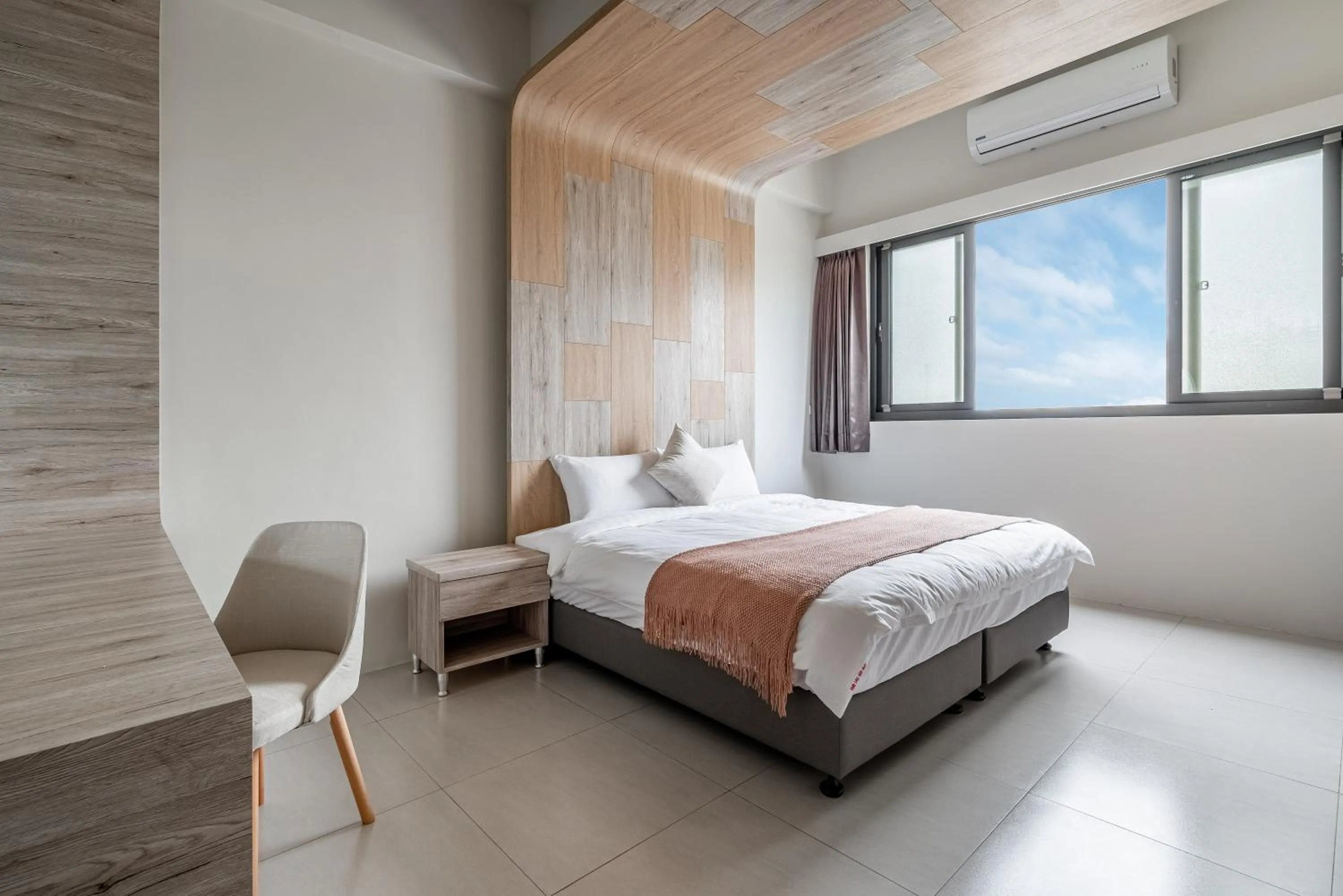 Photo of the whole room, Bed in Penghu SunSea Hall