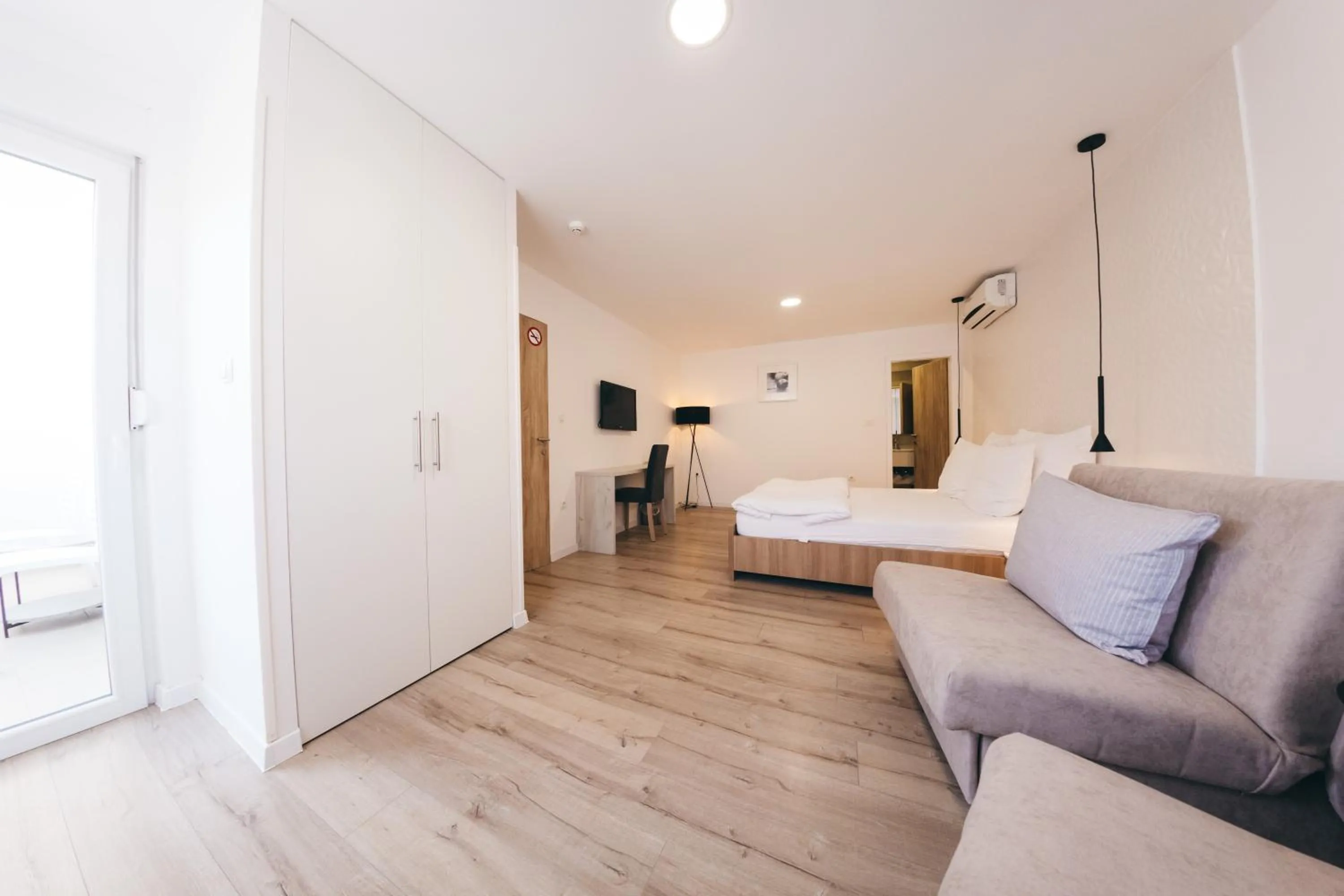 Photo of the whole room, Bed in City Apartment One