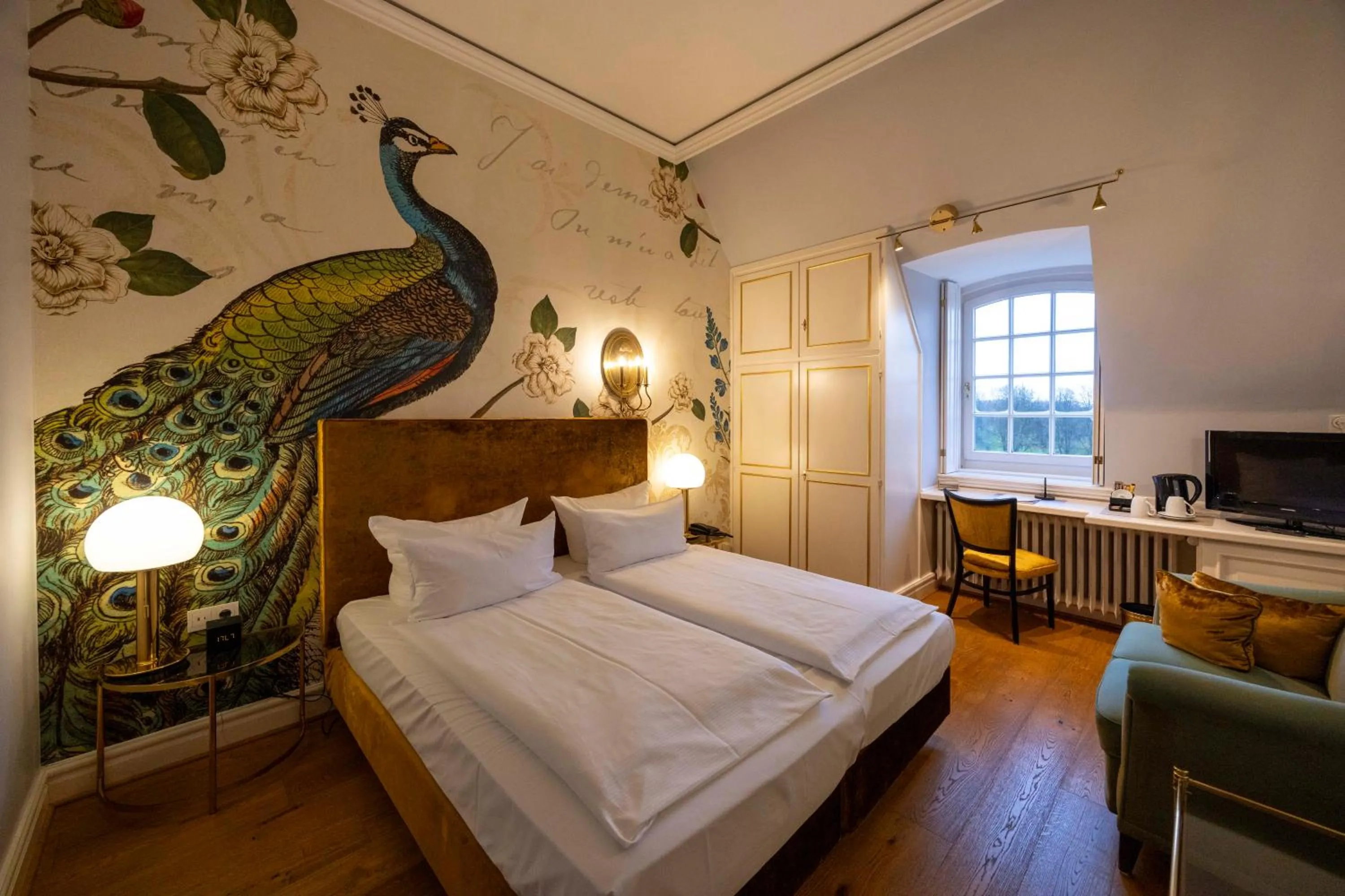 Bed in Hotel Schloss Wilkinghege