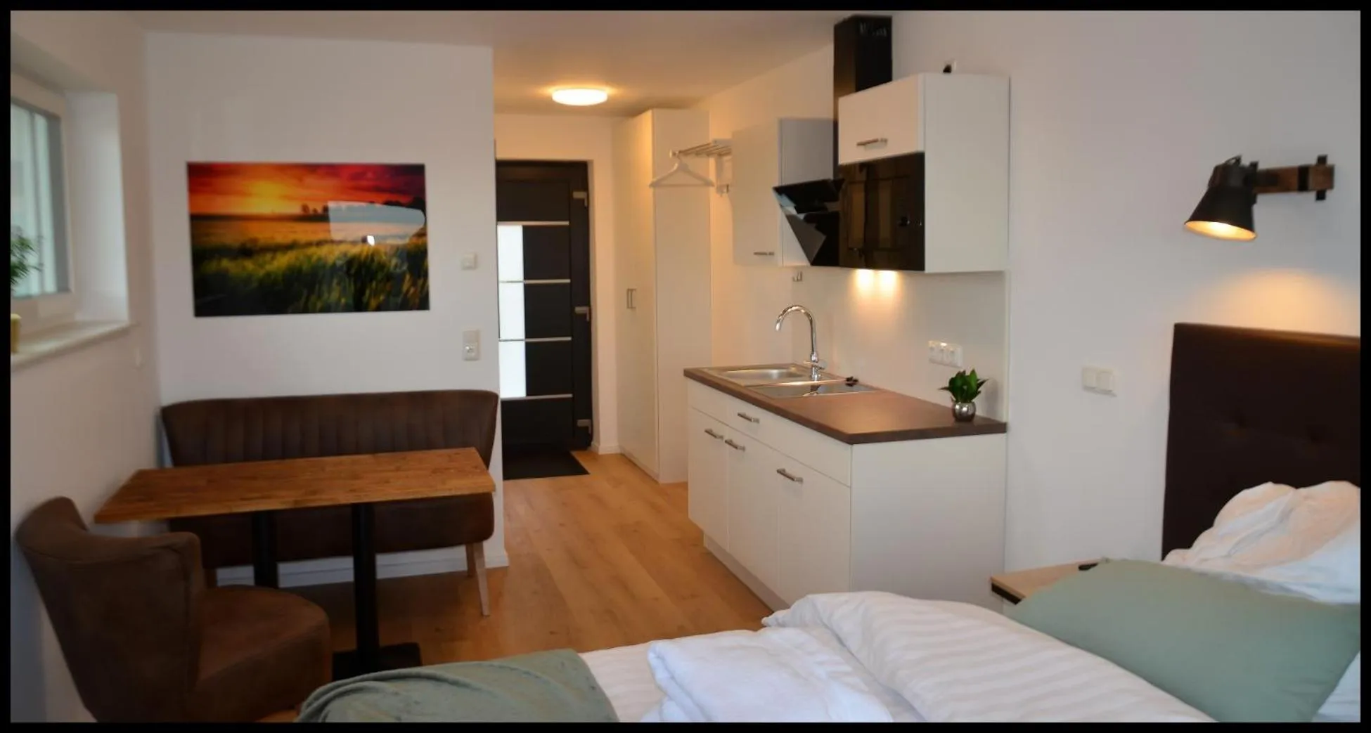 Kitchen or kitchenette, Bed in Fernweg Apartments