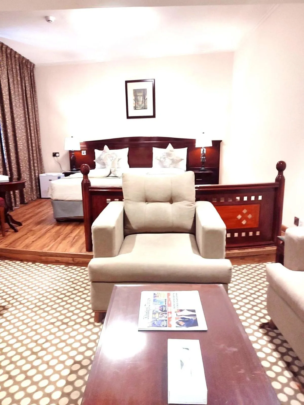 Living room, Bed in York International Hotel