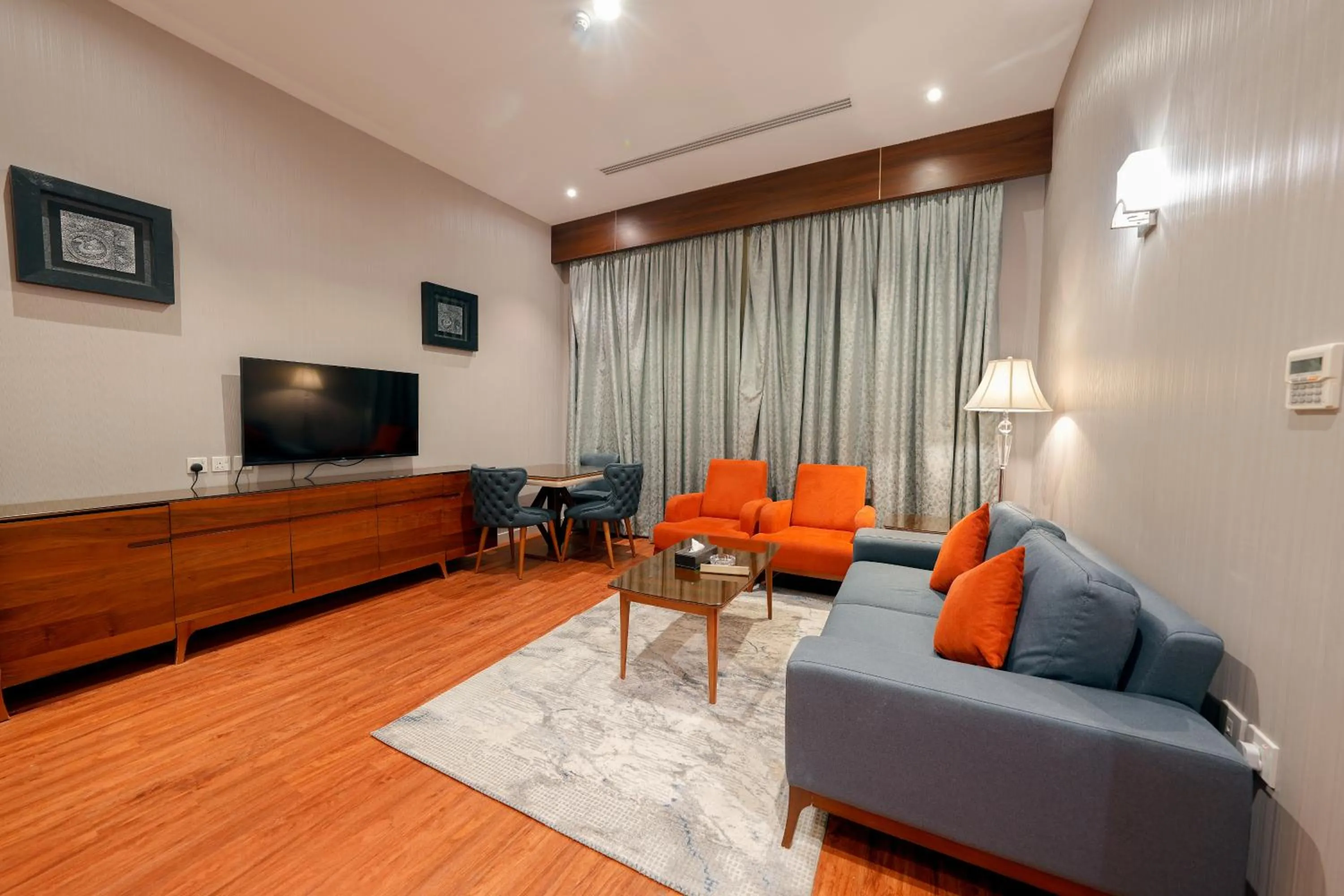 TV and multimedia in Celine Home Serviced Apartment Al Malqa