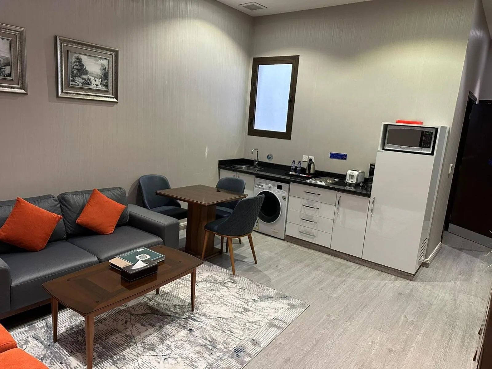 Kitchen or kitchenette in Celine Home Serviced Apartment Al Malqa