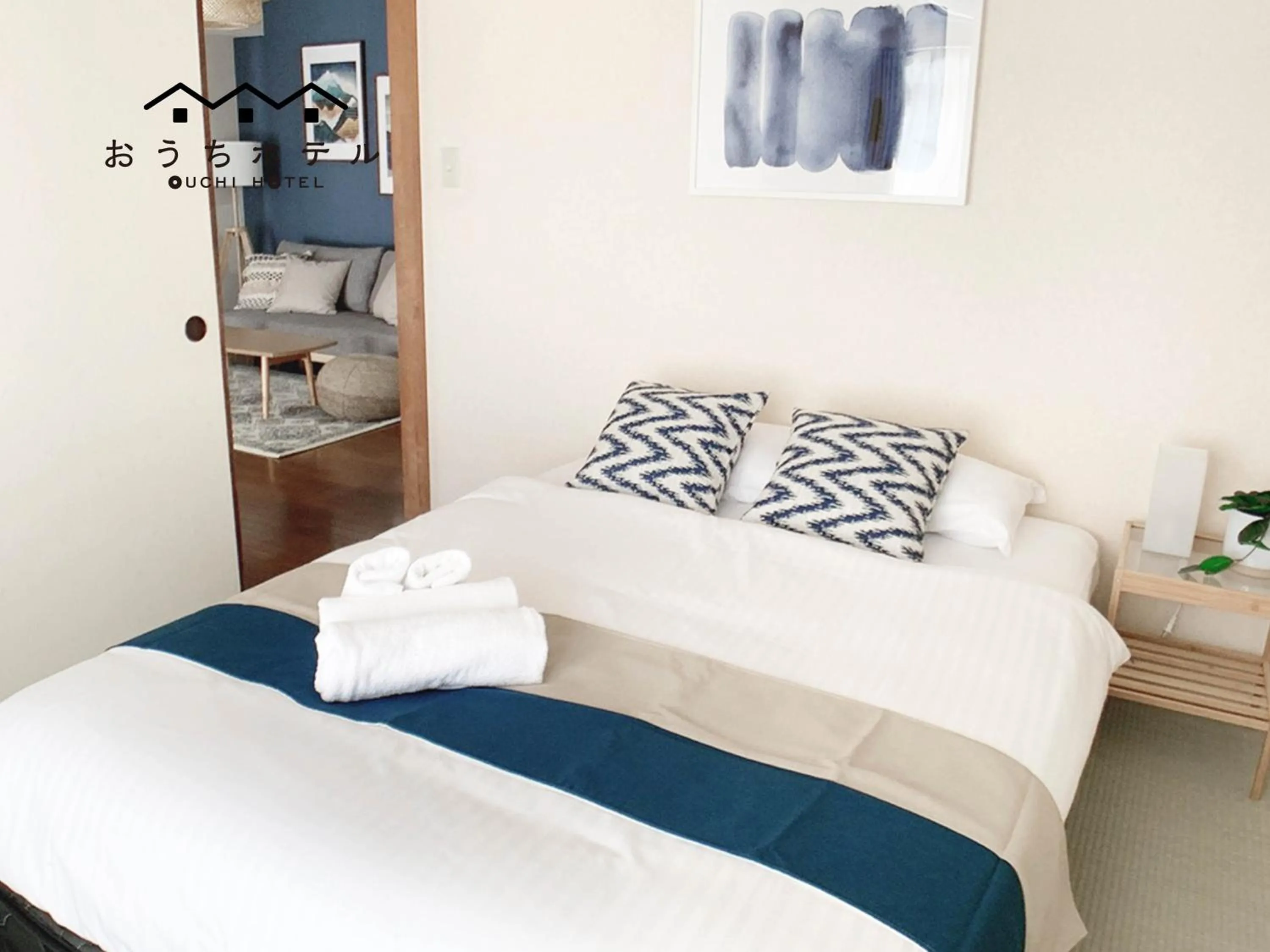 Bed in OUCHI HOTEL Hijiyama