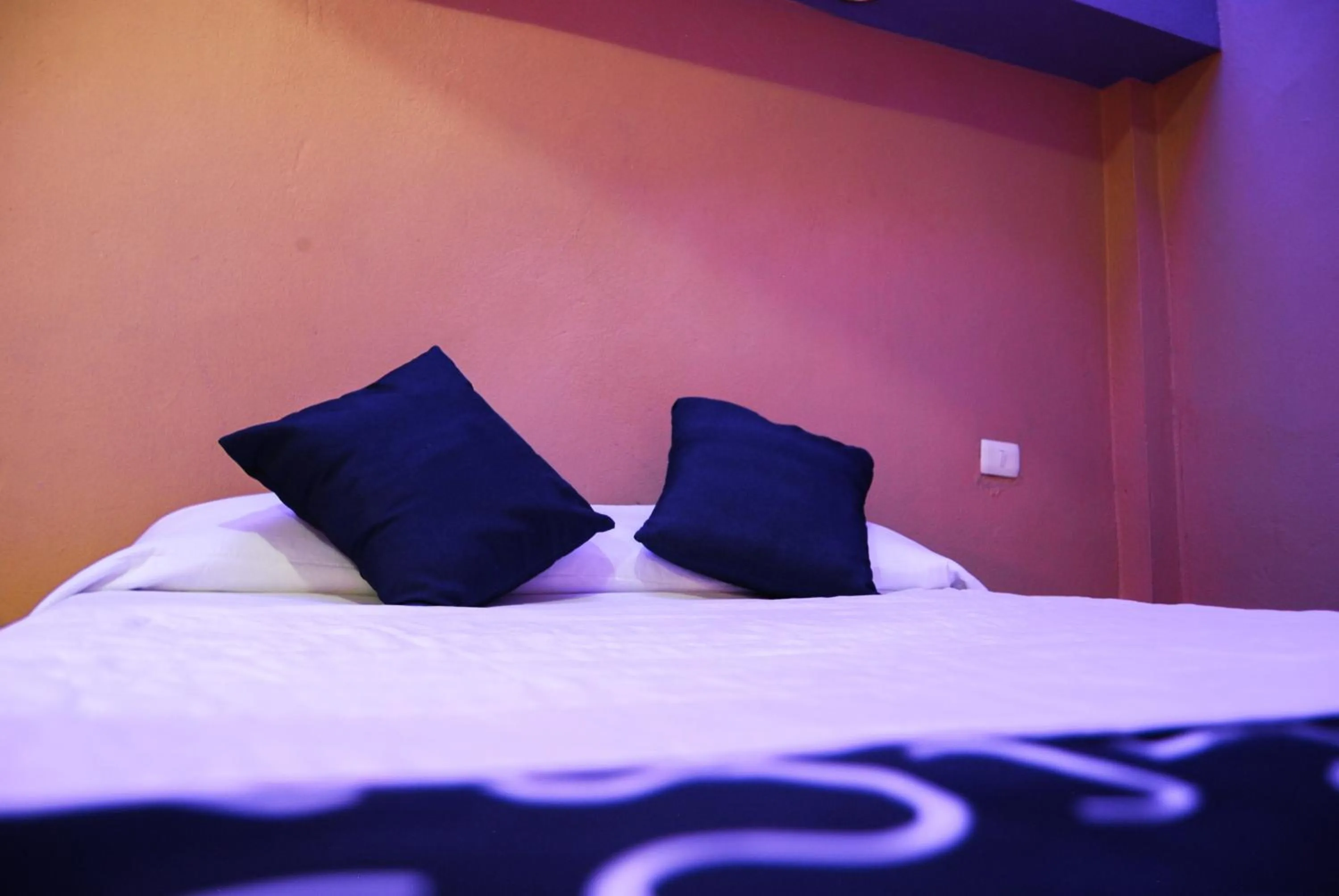 Bed in OYO Hotel Oasis