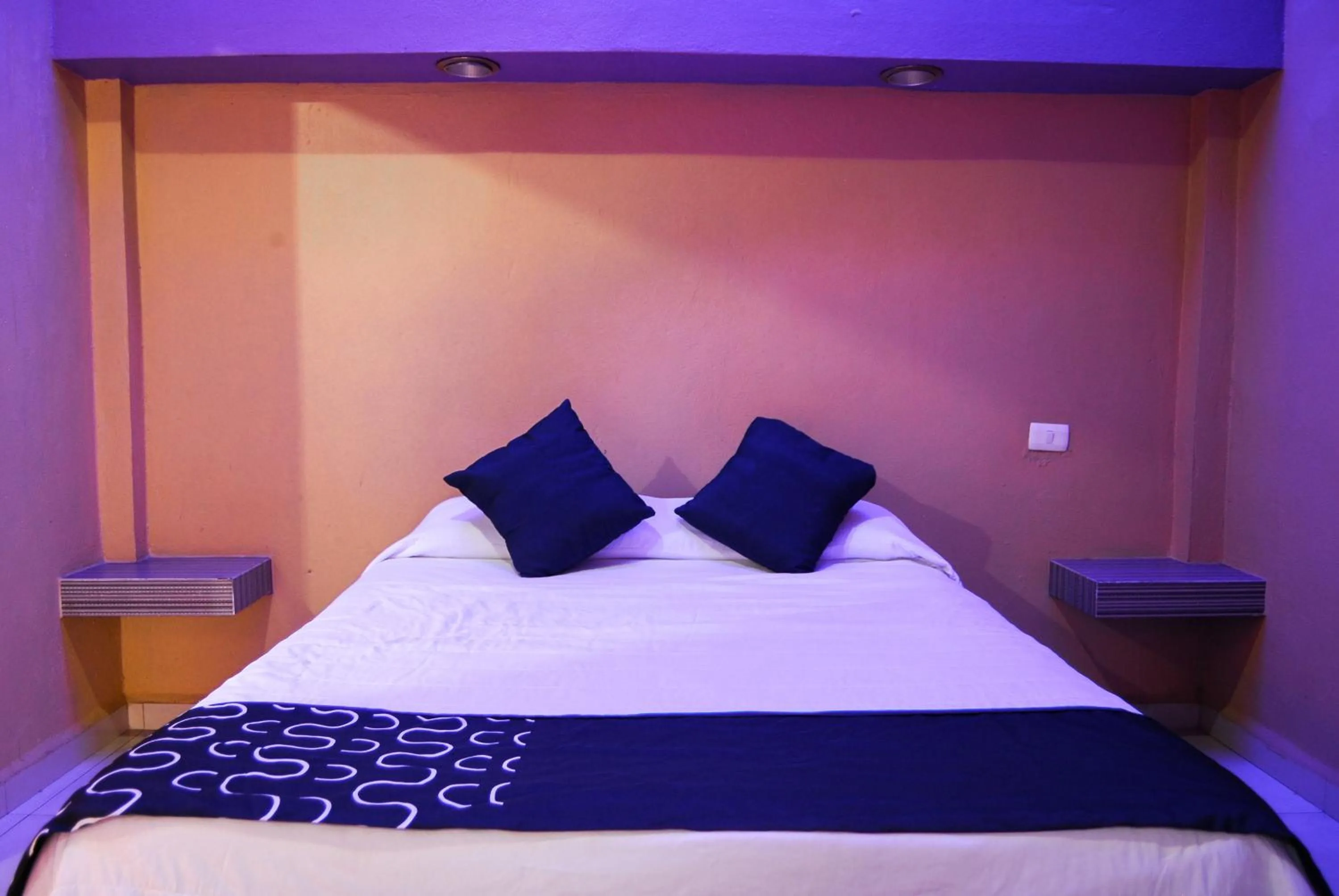 Bed in OYO Hotel Oasis