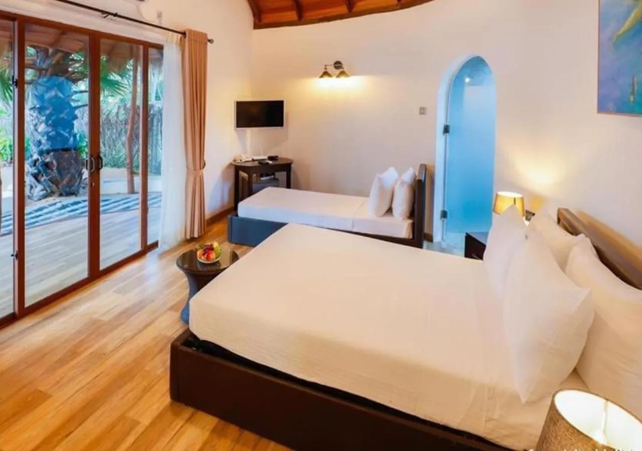 Bed in The Blue Lagoon Resort Kalpitiya