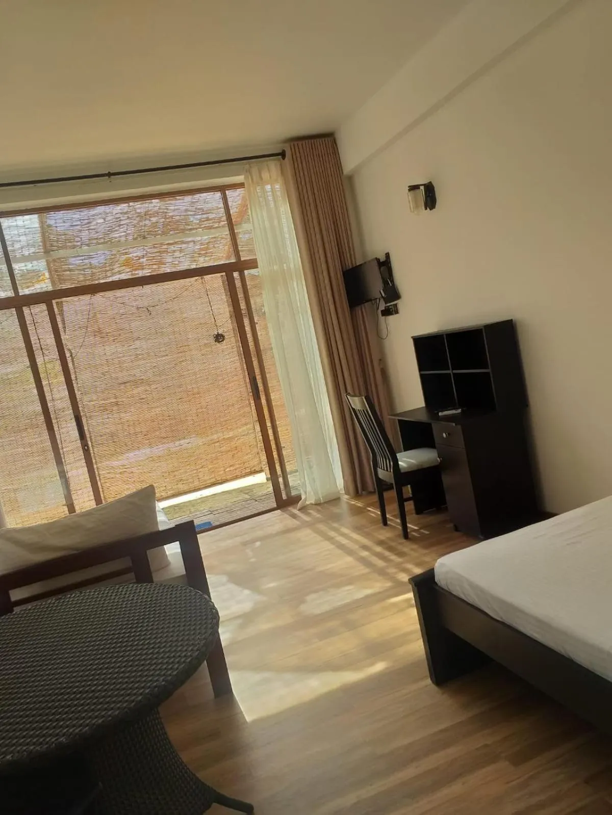 Communal lounge/ TV room, Bed in The Blue Lagoon Resort Kalpitiya