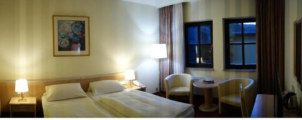 Bed in Landhotel Burkartsmühle