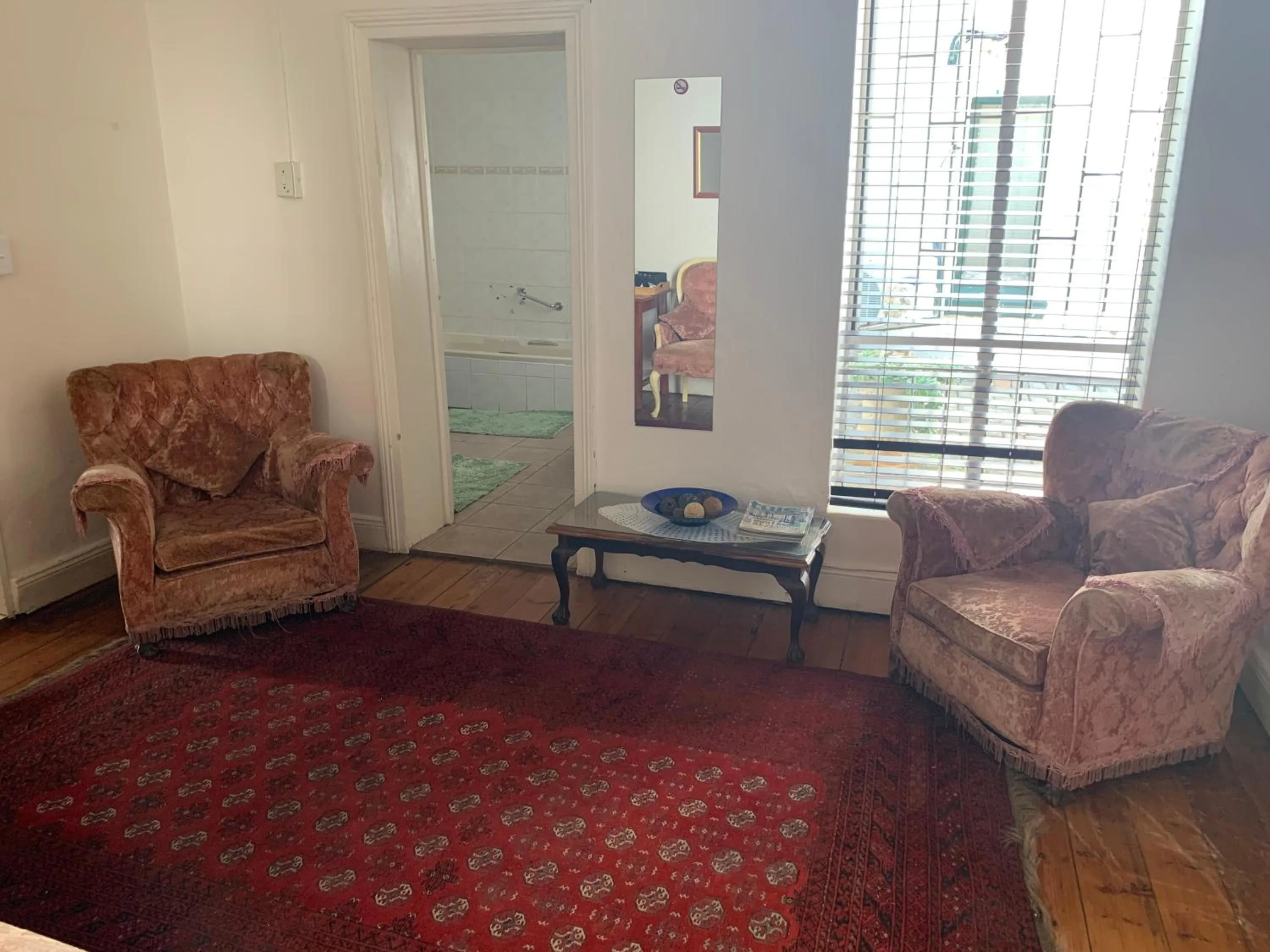 Communal lounge/ TV room in Alec Wright's Guest Lodge