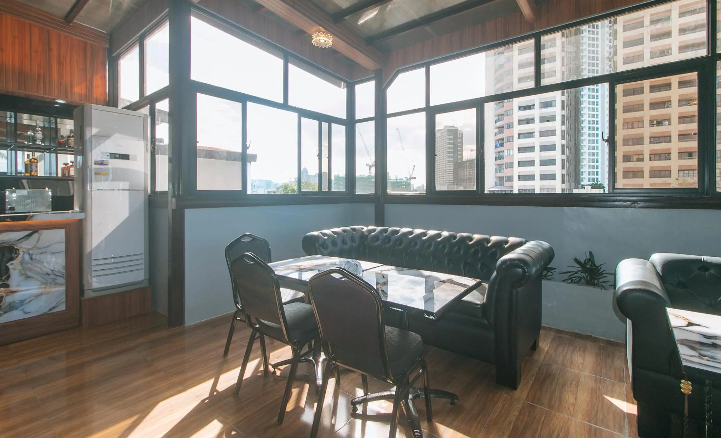 Seating area in RedDoorz Plus at Canley Residential