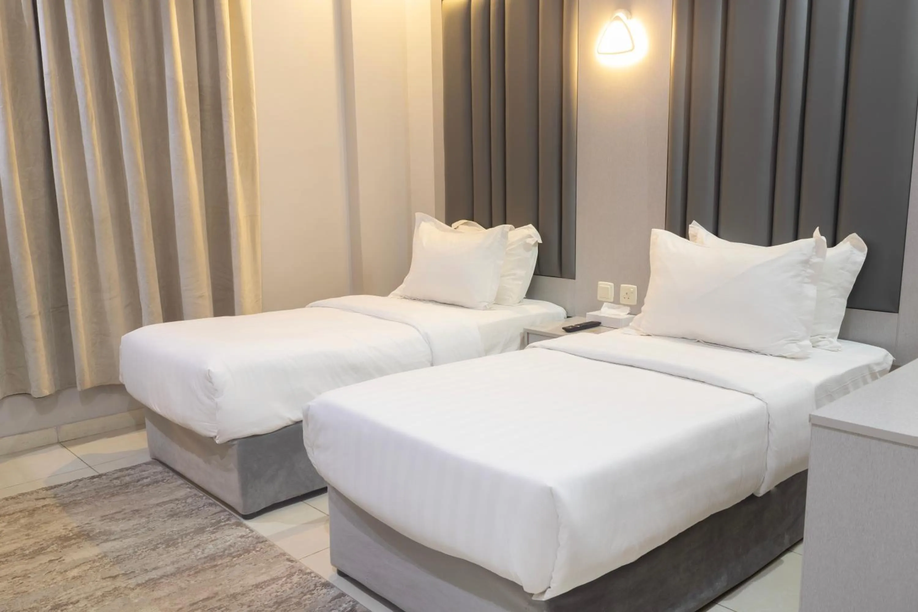 Bed in Areen Al Naeem Served Apartments