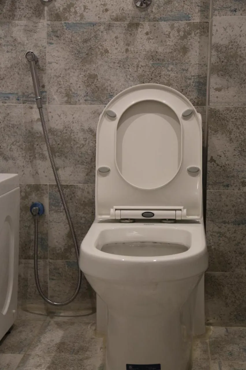 Toilet in Areen Al Naeem Served Apartments