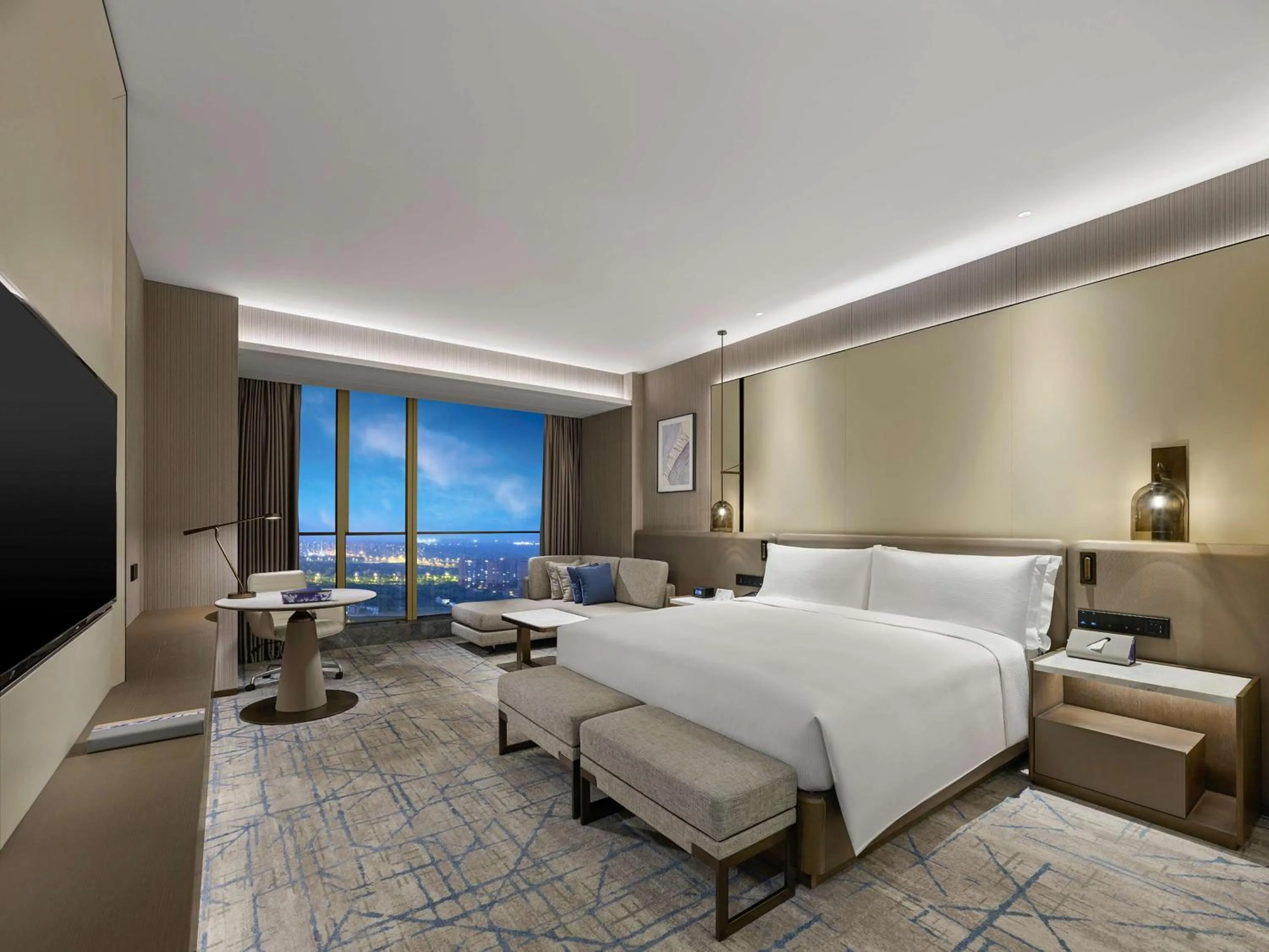 Bed in DoubleTree by Hilton Qidong