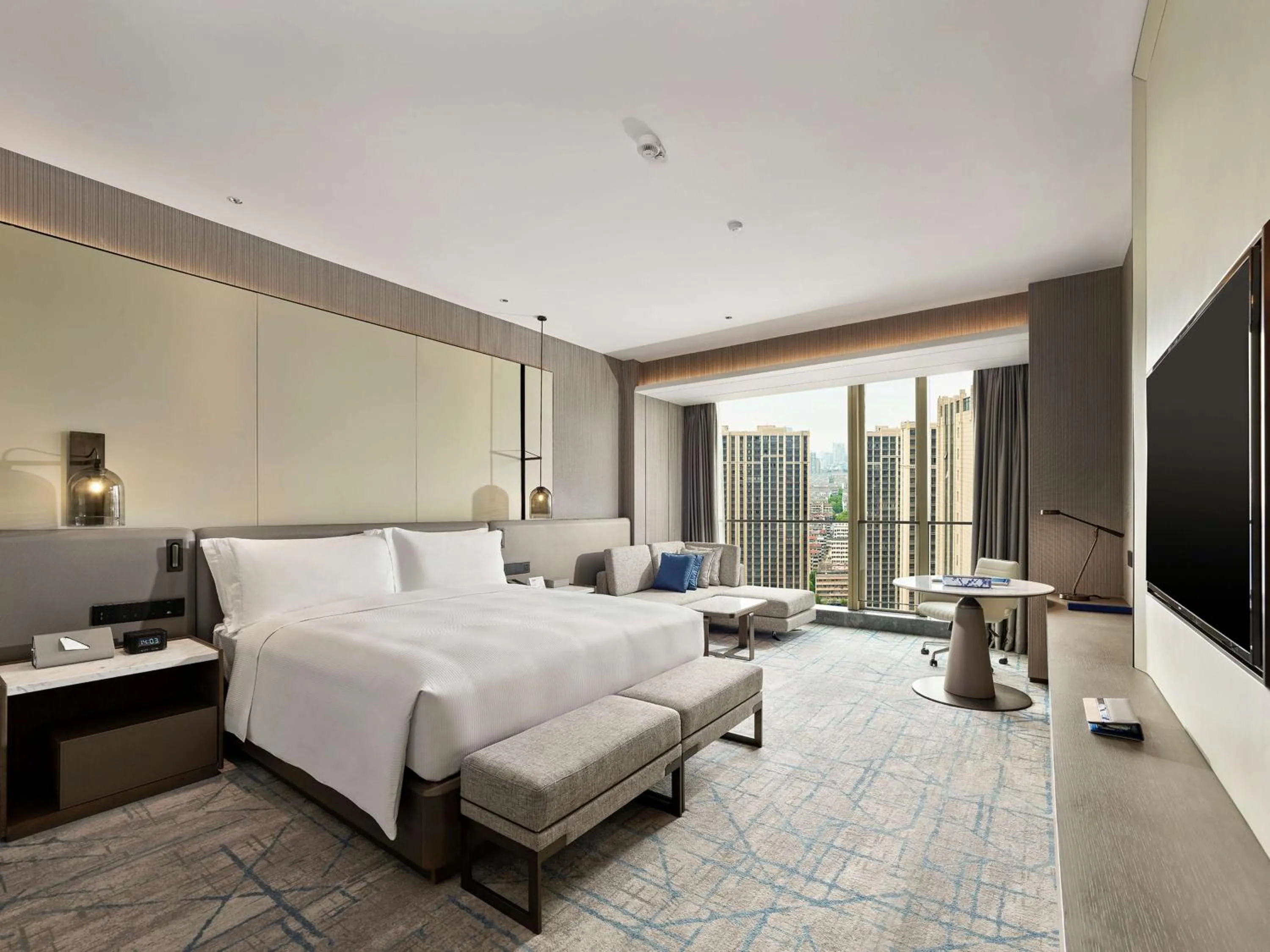 Bed in DoubleTree by Hilton Qidong