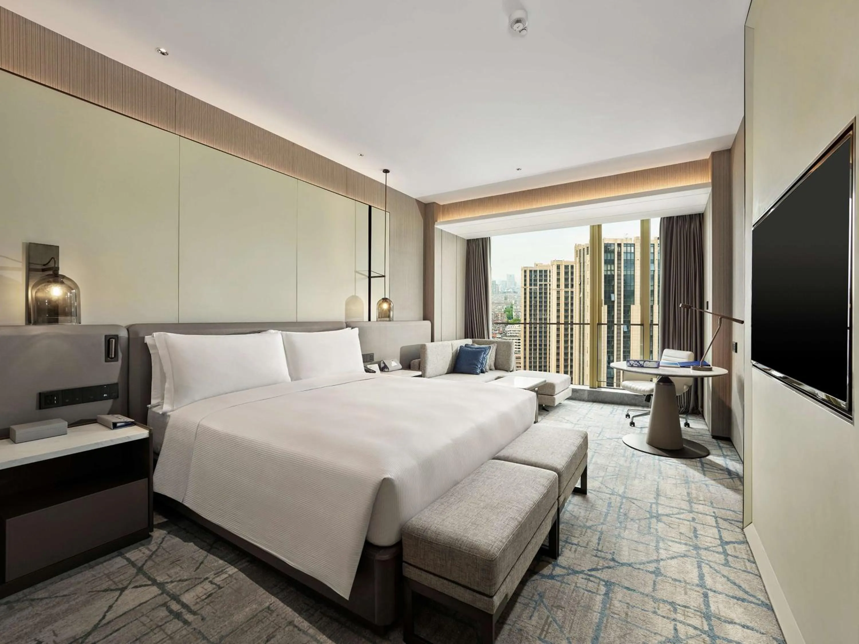 Bed in DoubleTree by Hilton Qidong