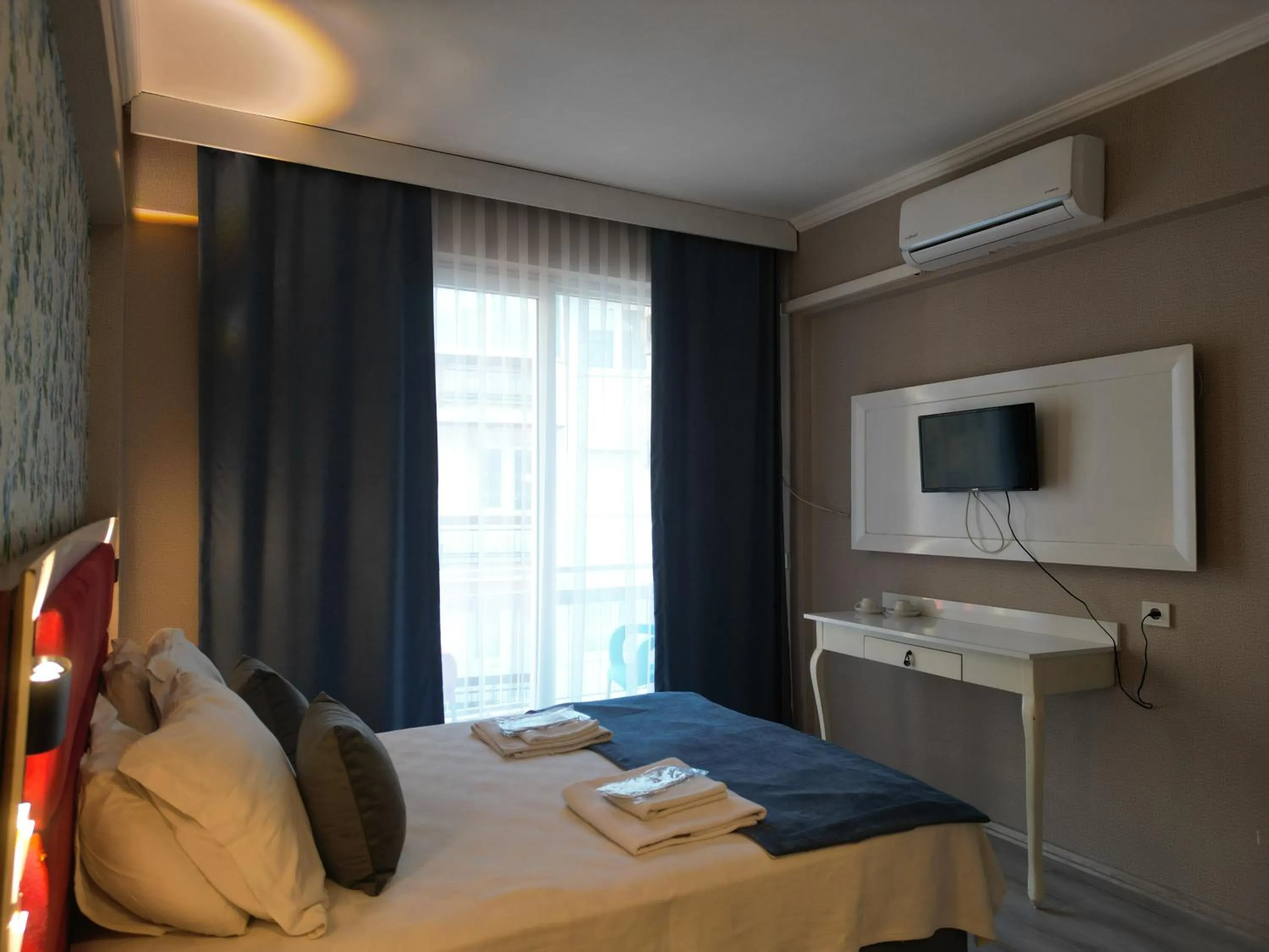 Bed in Akman City Hotel