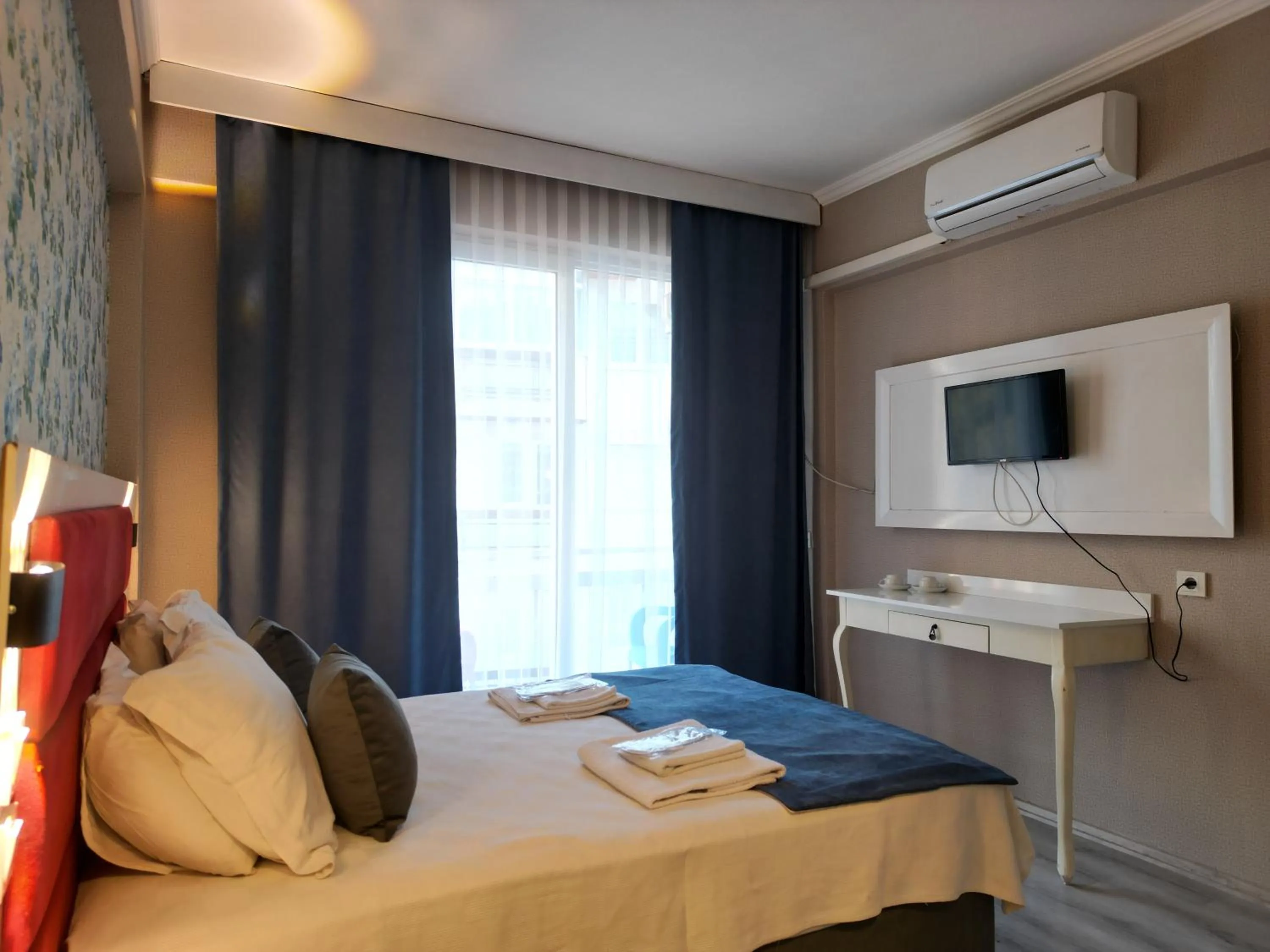 Bed in Akman City Hotel