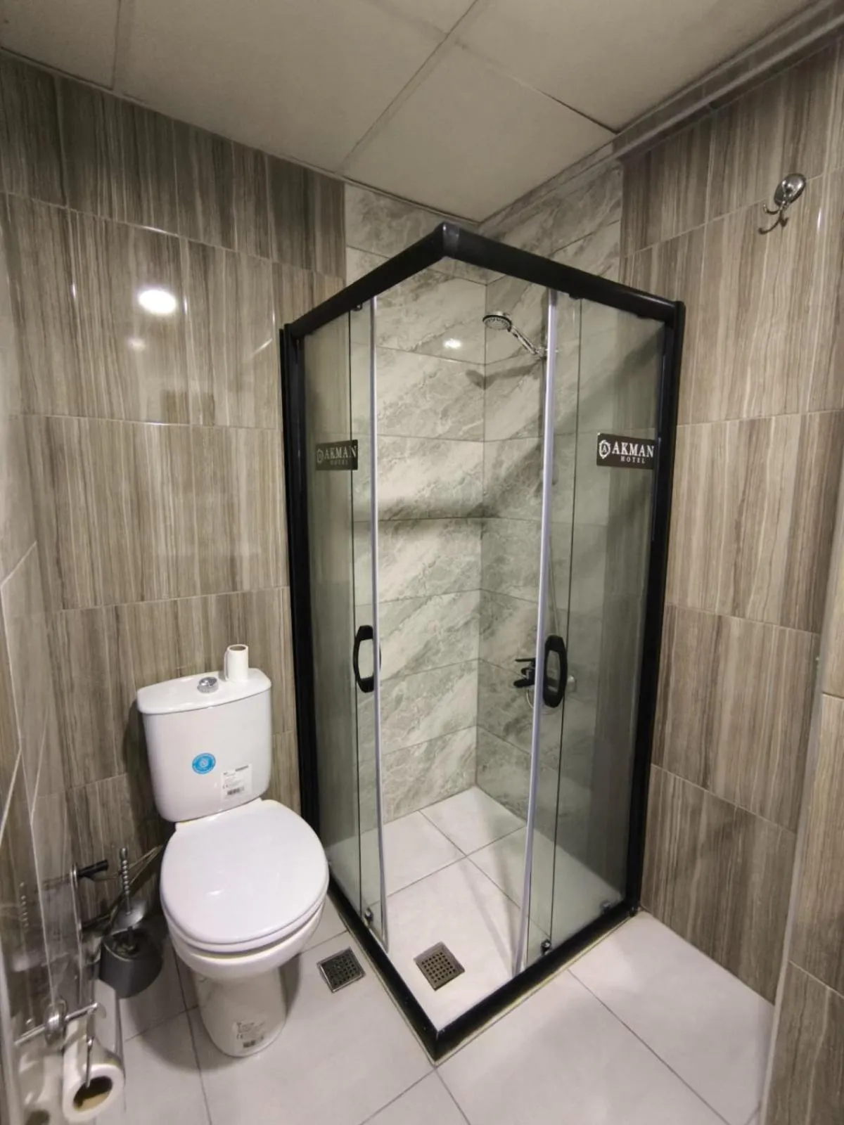 Shower in Akman City Hotel