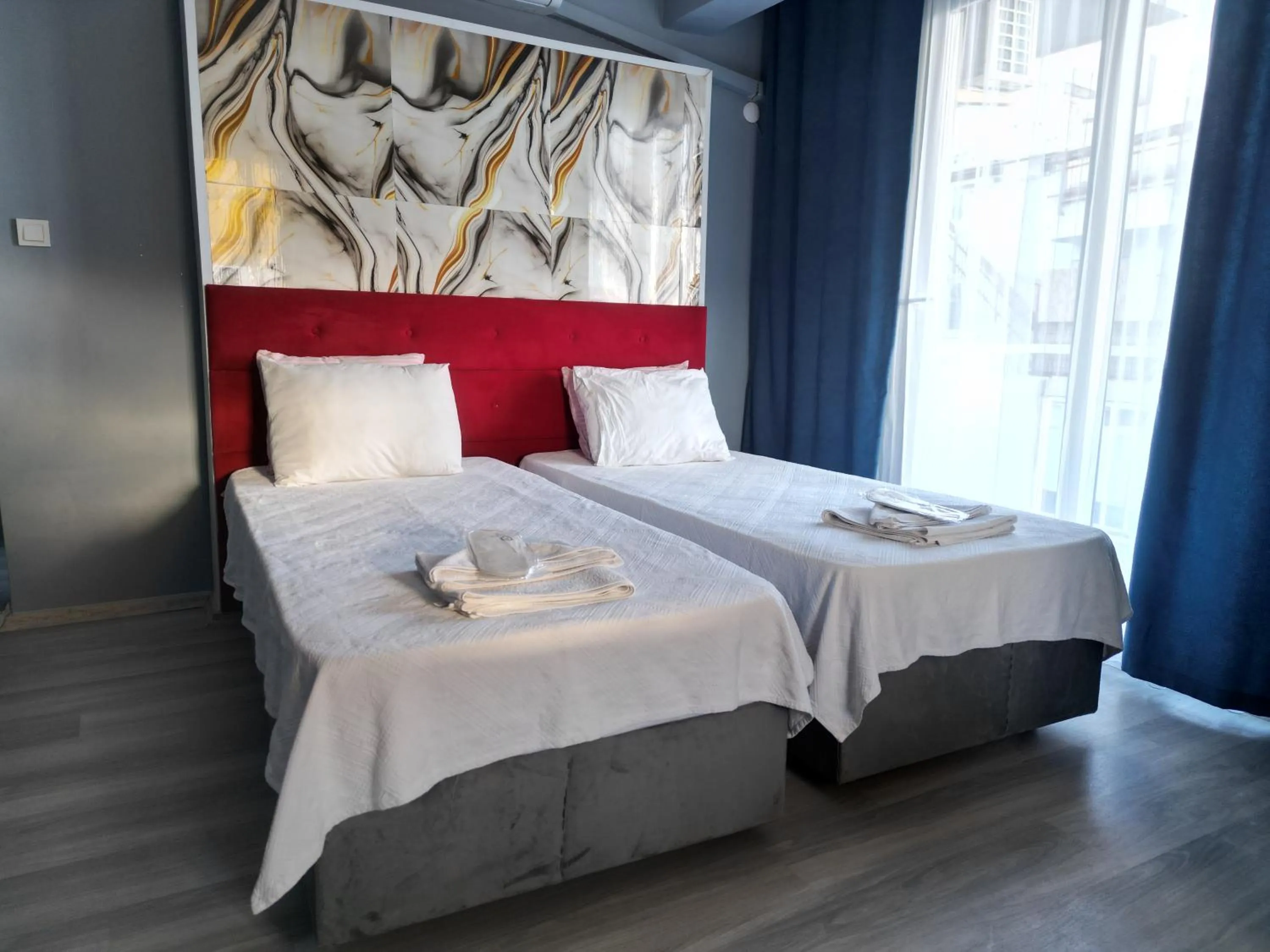 Bed in Akman City Hotel