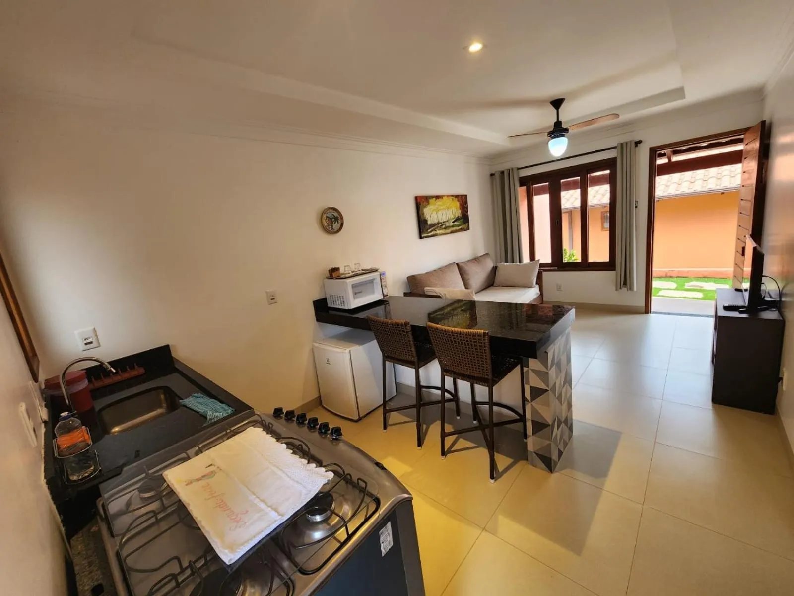 Communal lounge/ TV room, Bed in Pousada Camarás