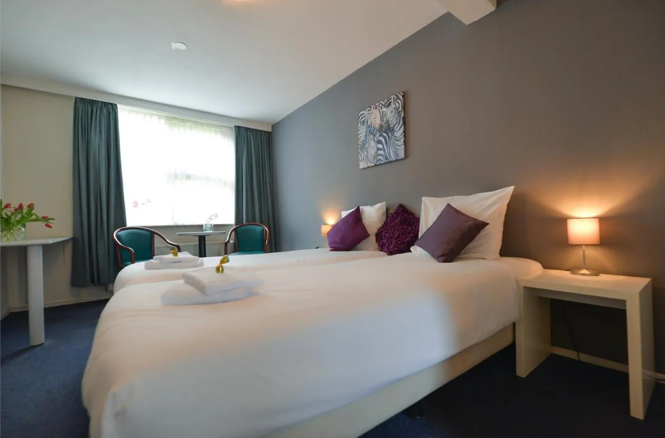 Bed in Hotel de Grote Zwaan