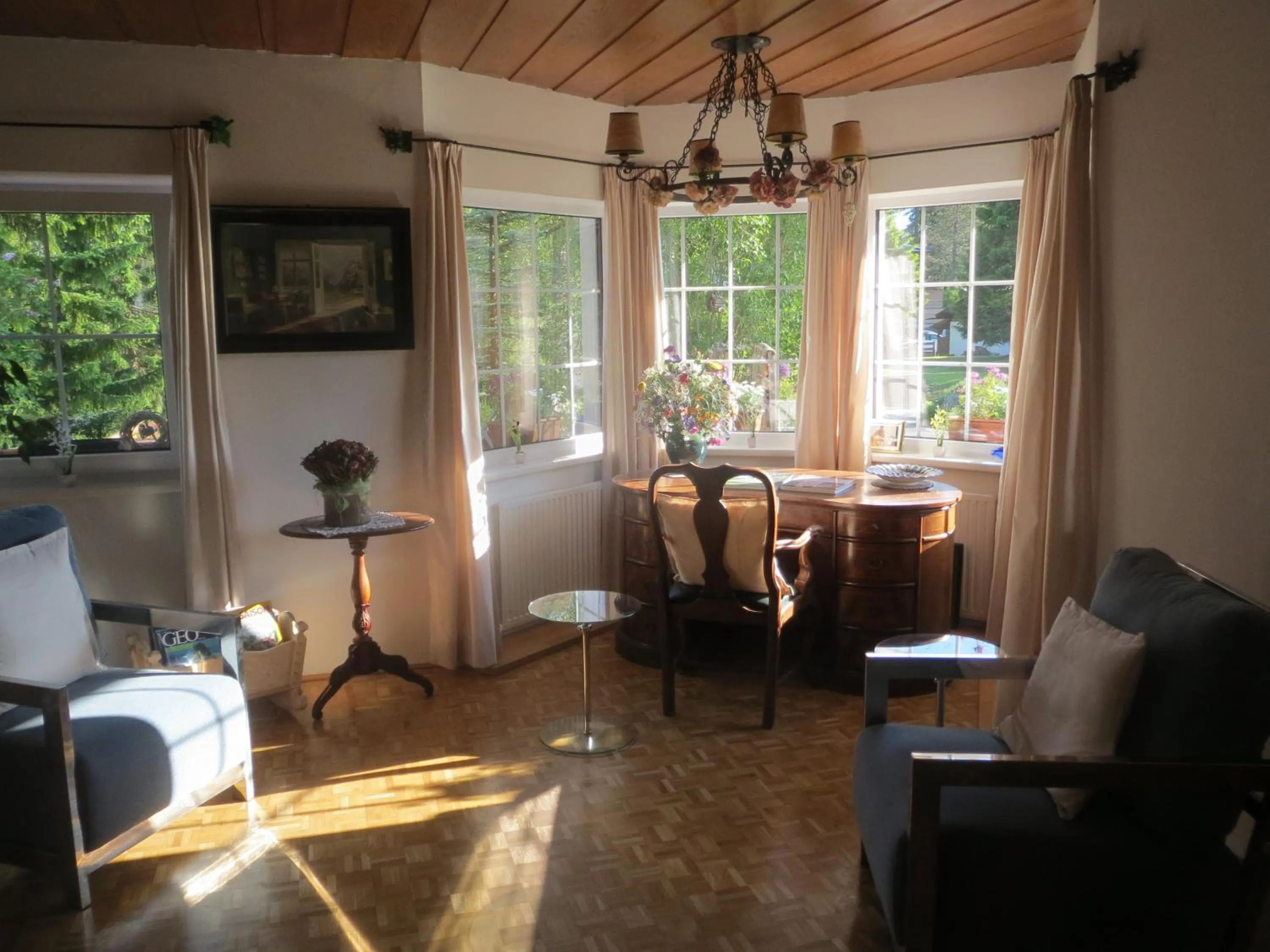 Communal lounge/ TV room in Landhaus Charlotte Apartments Tirol