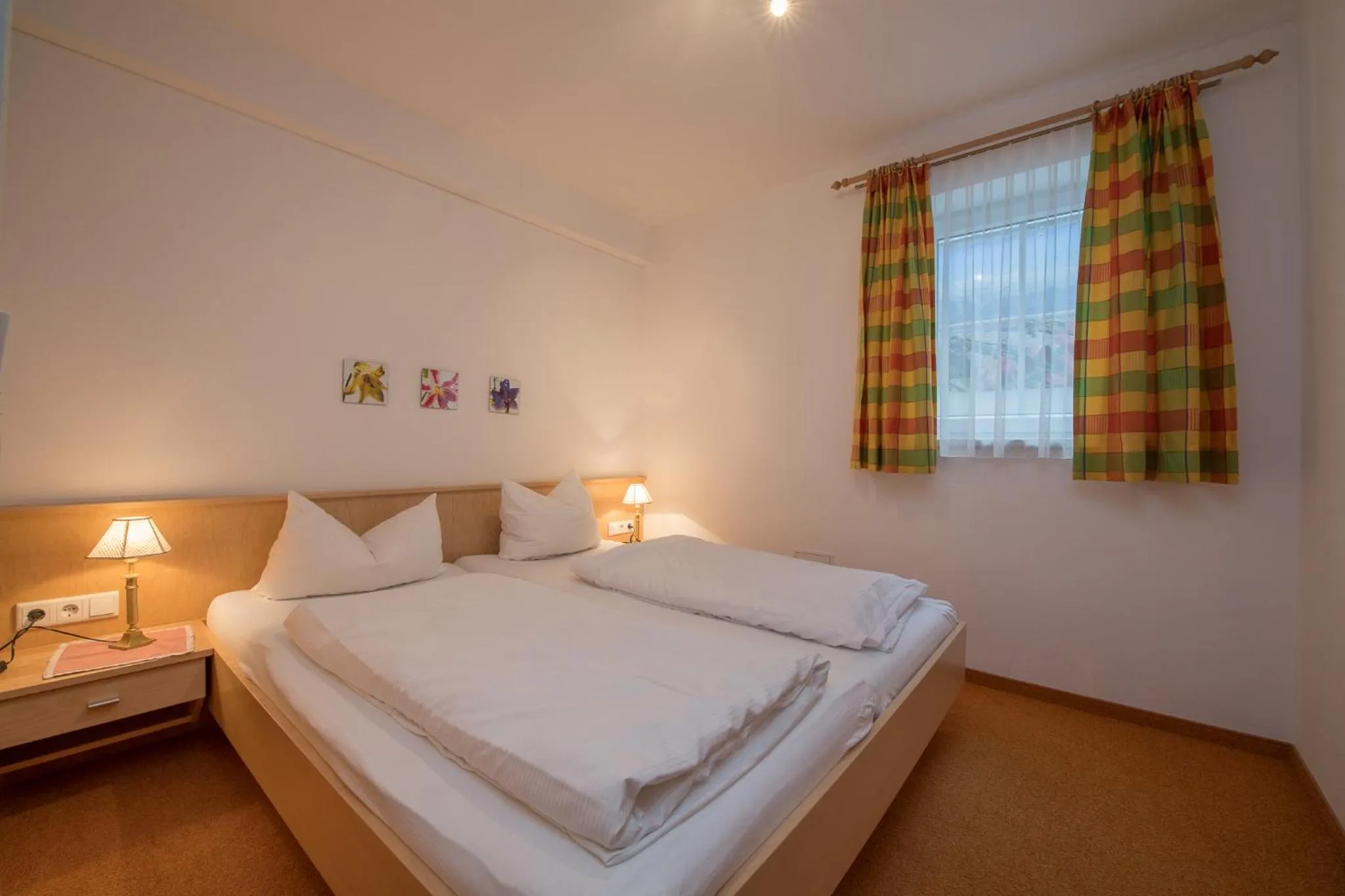 Bedroom, Bed in Landhaus Charlotte Apartments Tirol