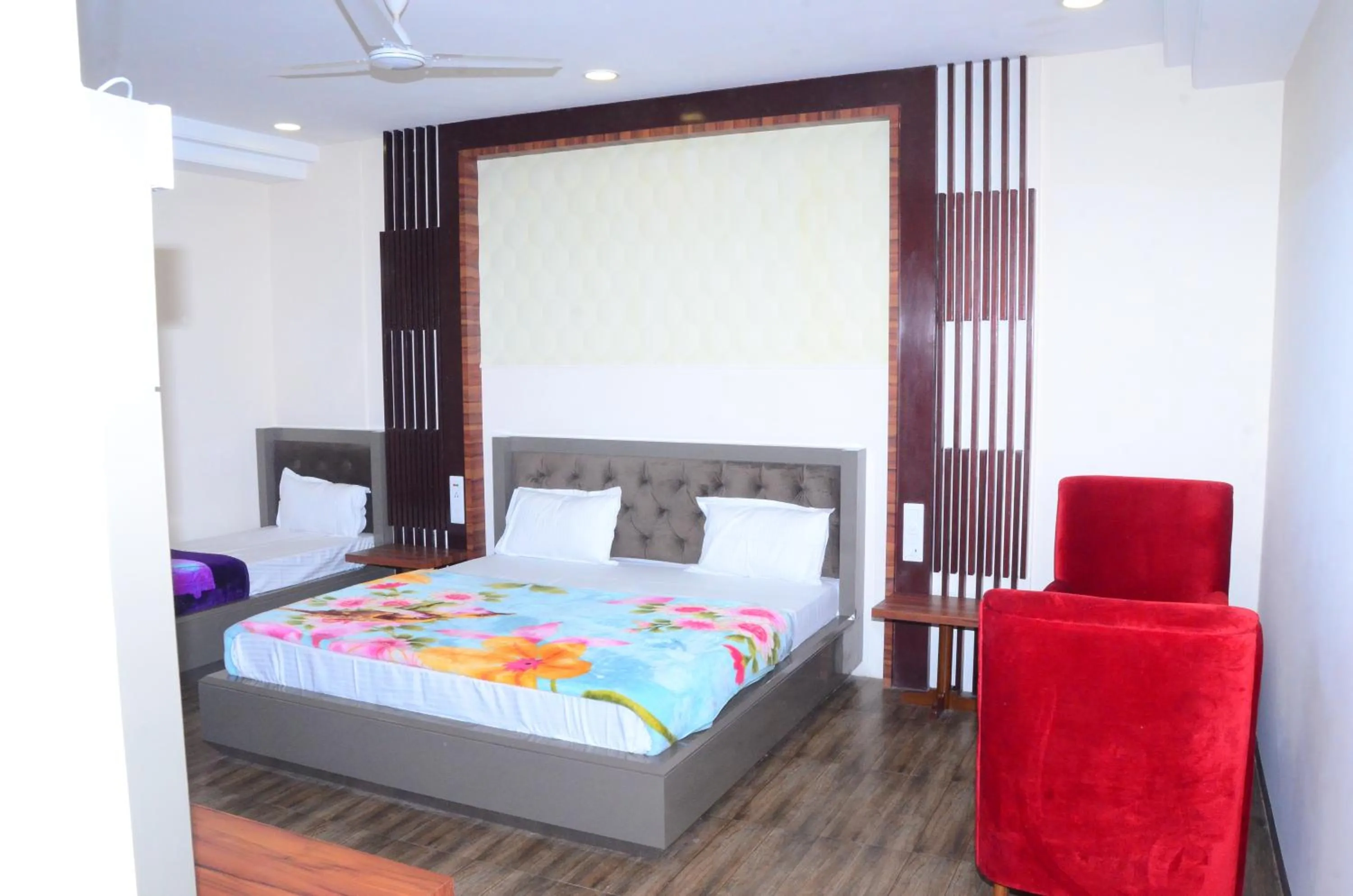 Bed in DUDI HOTEL