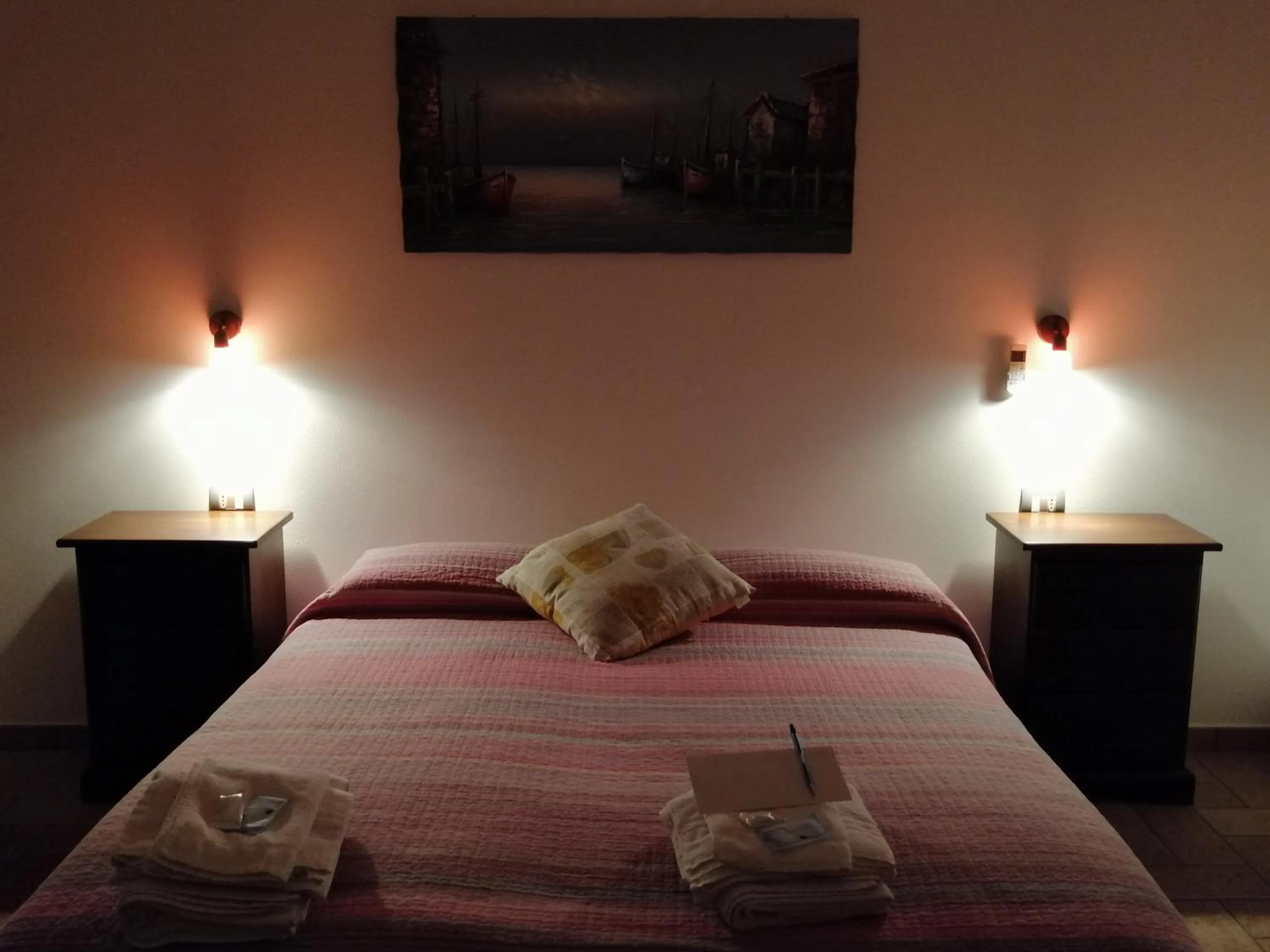 Communal lounge/ TV room, Bed in La Casa della Nonna