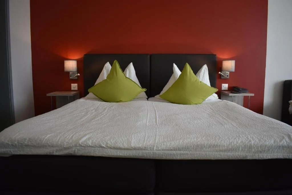 Photo of the whole room, Bed in Hotel AM Schloss