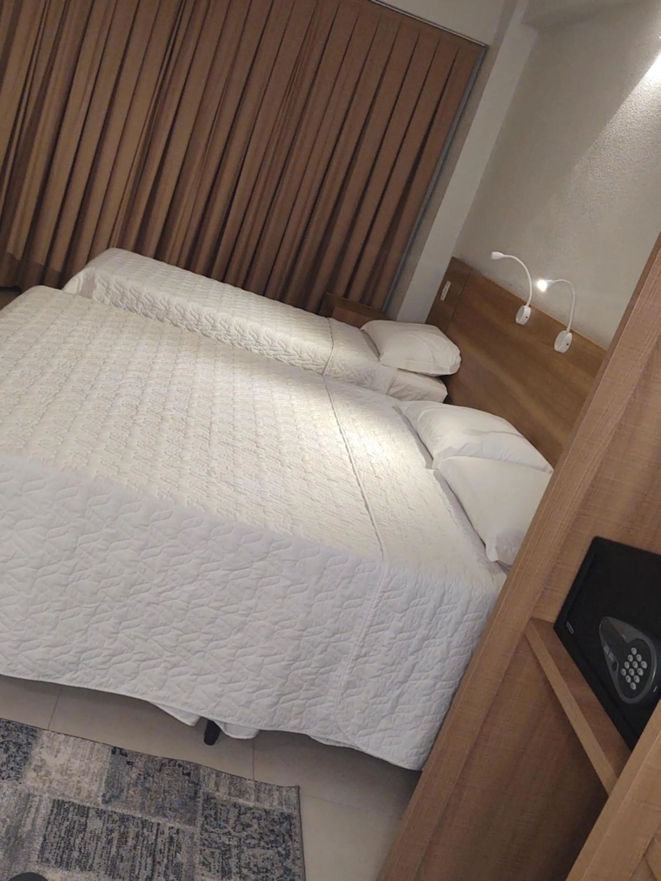 Bed in Hotel Quartzo