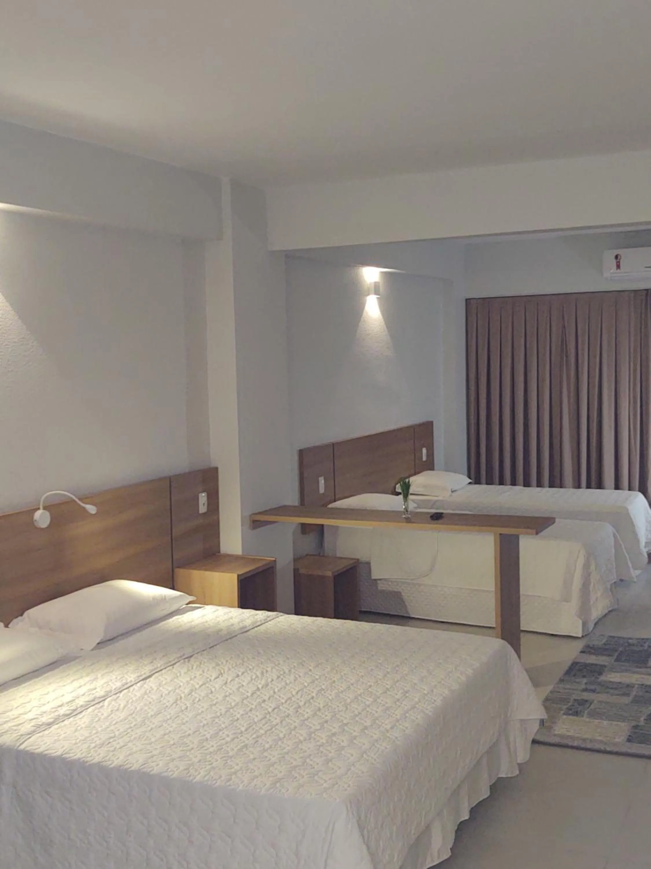 Bed in Hotel Quartzo