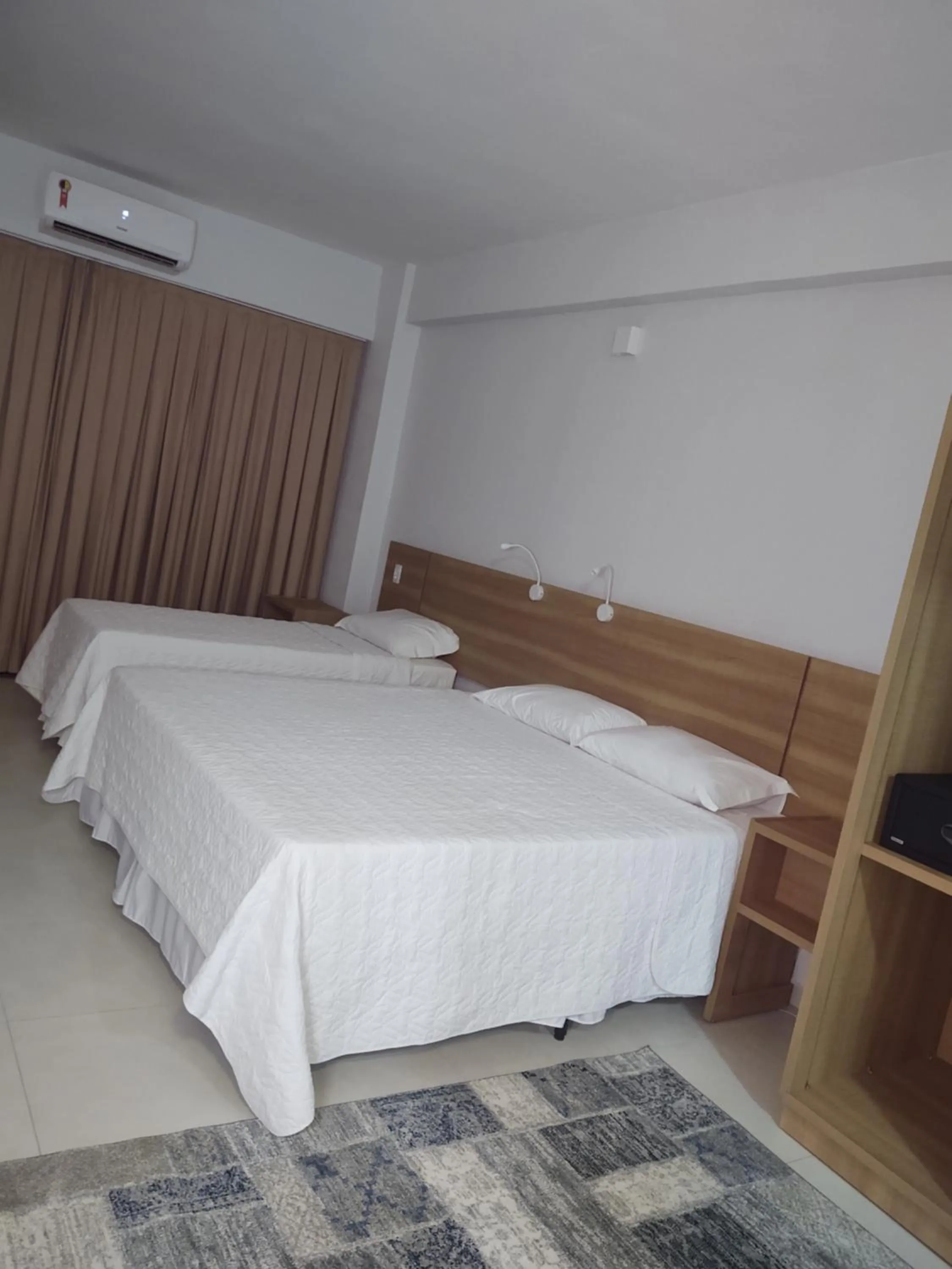 Bed in Hotel Quartzo