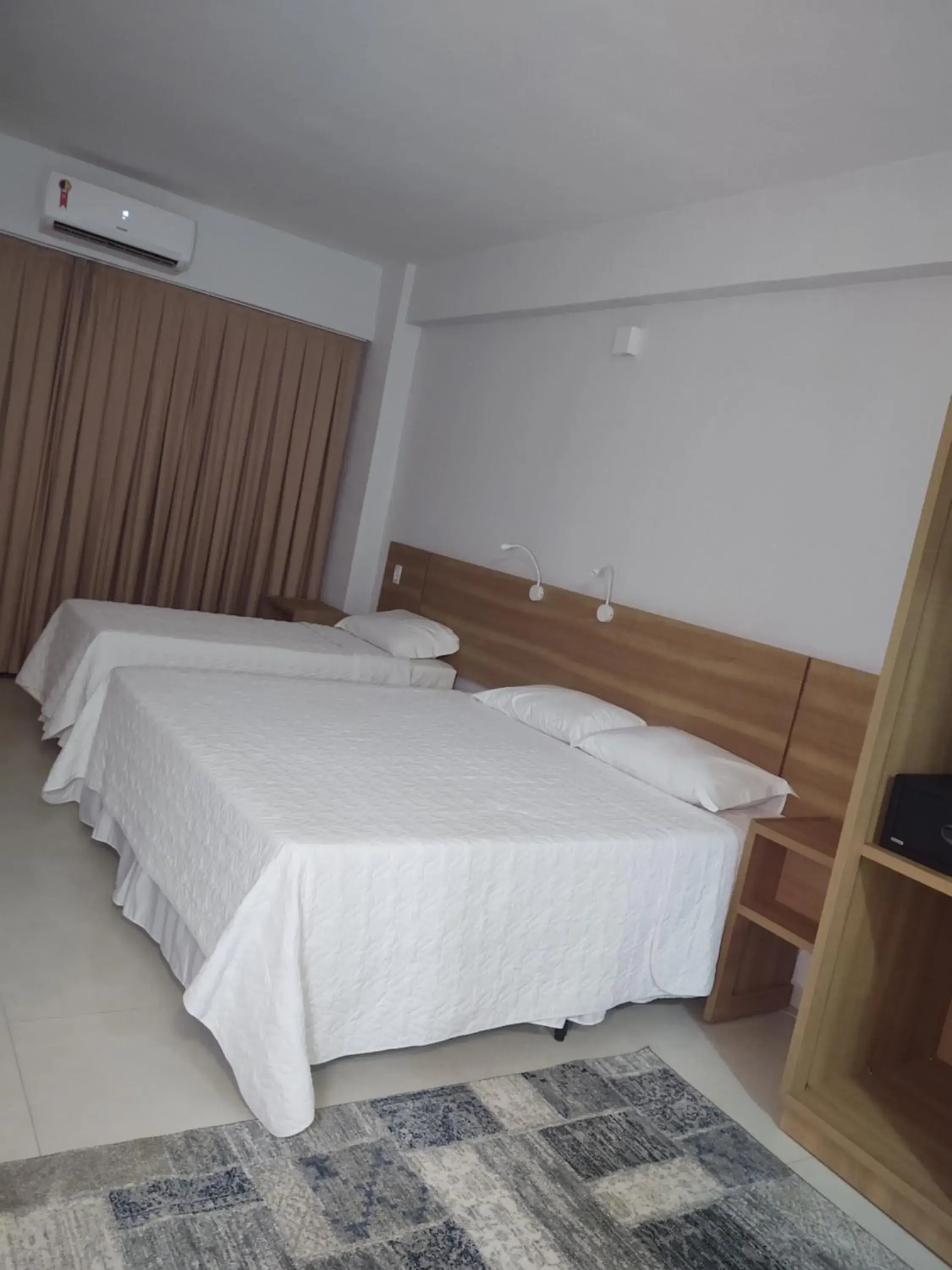 Triple Room with Balcony - single occupancy in Hotel Quartzo Triple Room with Balcony - single occupancy in Hotel Quartzo