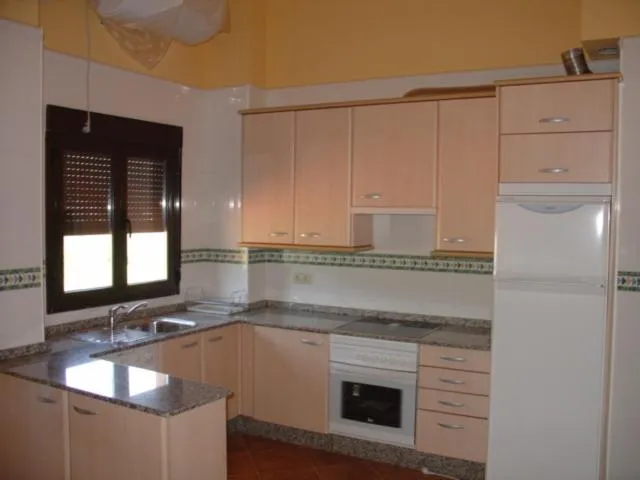 Kitchen or kitchenette in Apartamentos Rurales de Abelleira