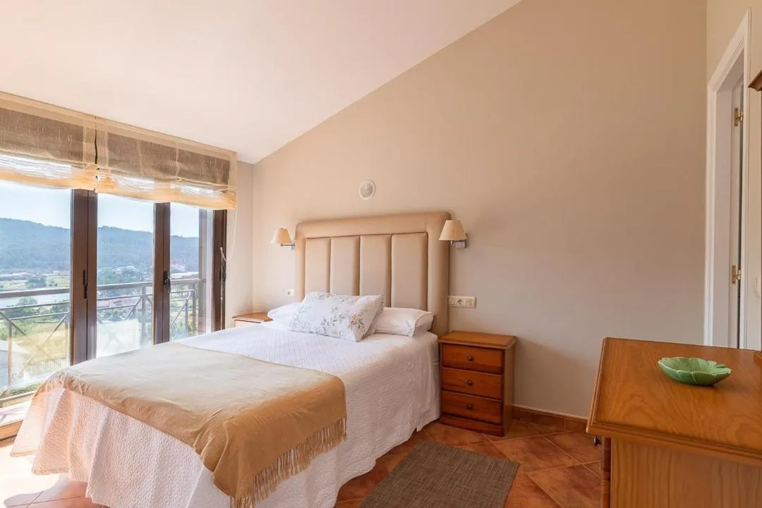 Bed in Apartamentos Rurales de Abelleira